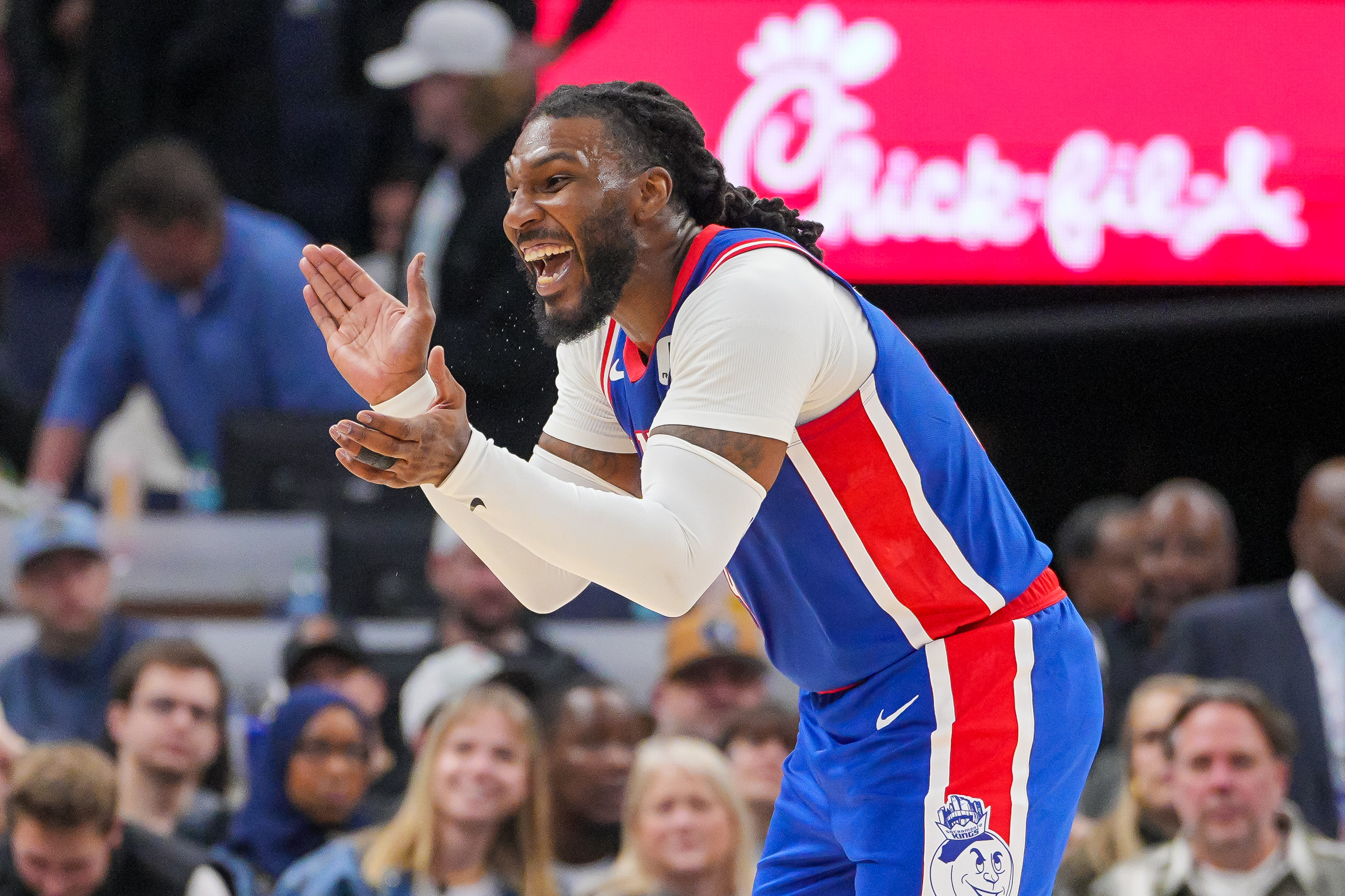 Nov 27, 2024; Minneapolis, Minnesota, USA; Sacramento Kings forward Jae Crowder (99) celebrates against the Minnesota Timberwolves in the fourth quarter at Target Center. Mandatory Credit: Brad Rempel-Imagn Images  