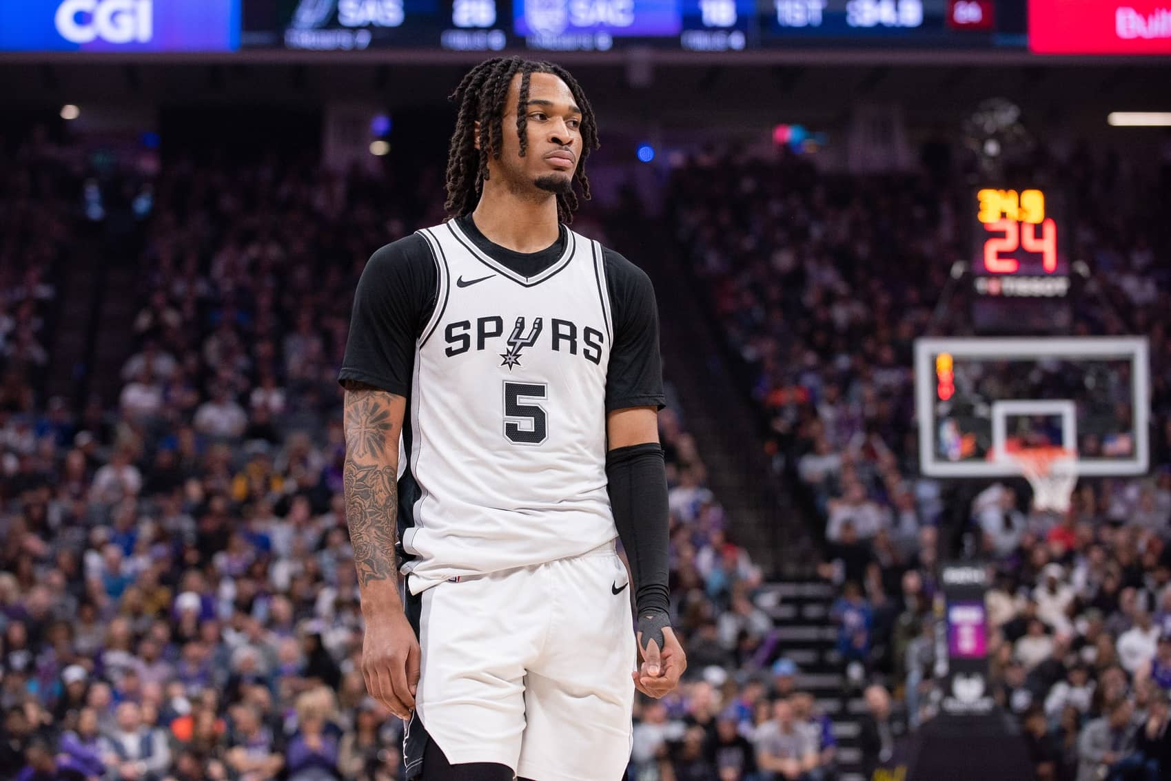 San Antonio Spurs guard Stephon Castle (5) looks on during the first quarter of the game against the Sacramento Kings at Golden 1 Center.