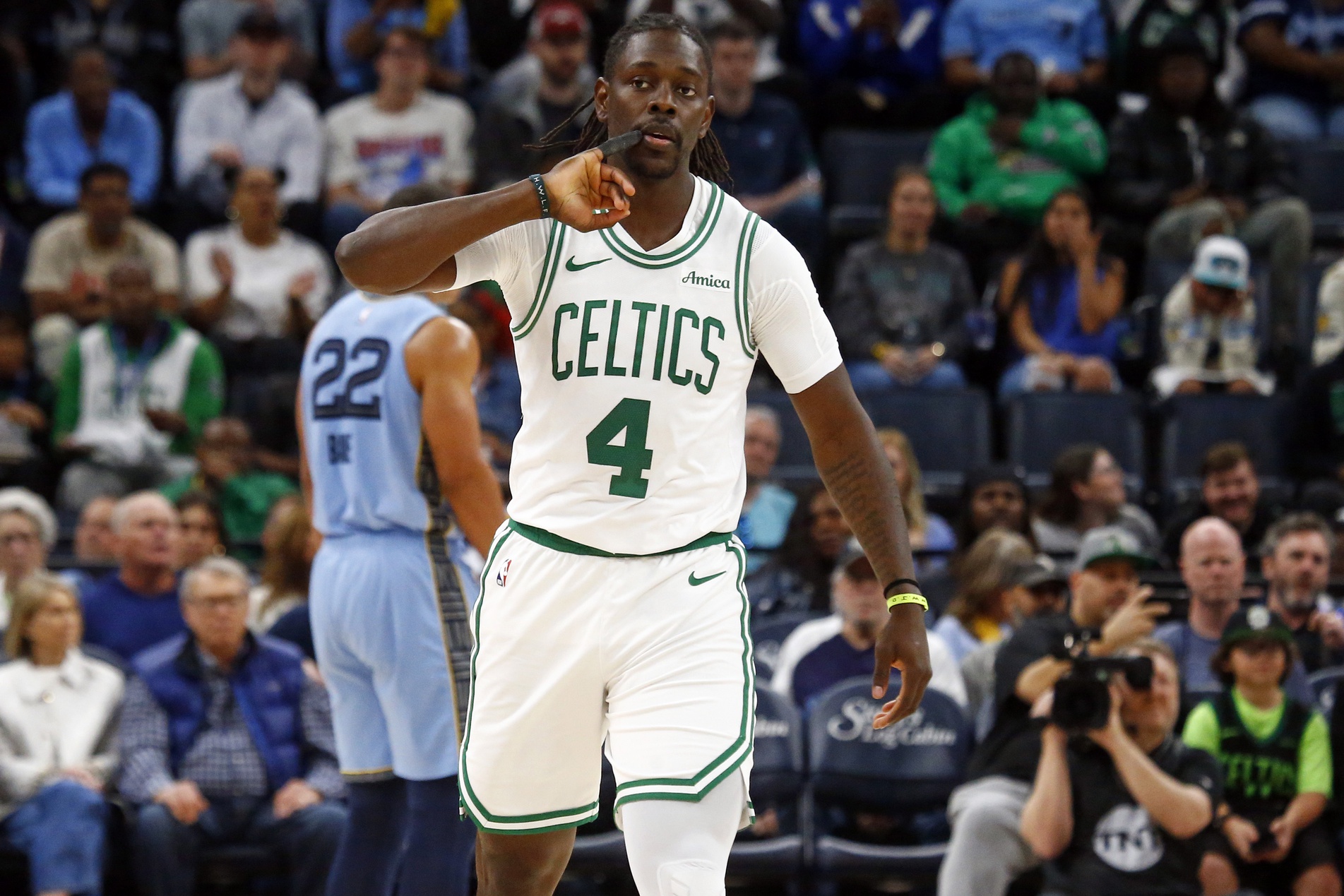 Boston Celtics guard Jrue Holiday (4) reacts during the third quarter against the Memphis Grizzlies at FedExForum. Mandatory Credit: Petre Thomas-Imagn Images