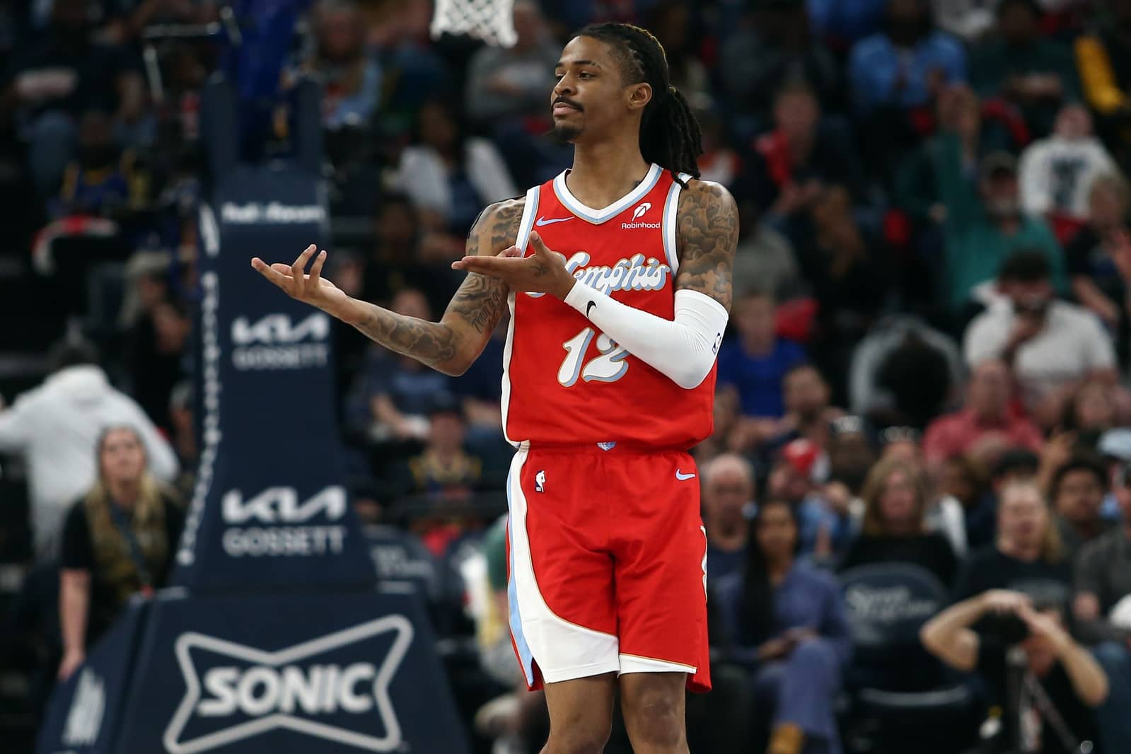 Memphis Grizzlies guard Ja Morant (12) reacts after a basket during the second quarter against the Golden State Warriors at FedExForum.