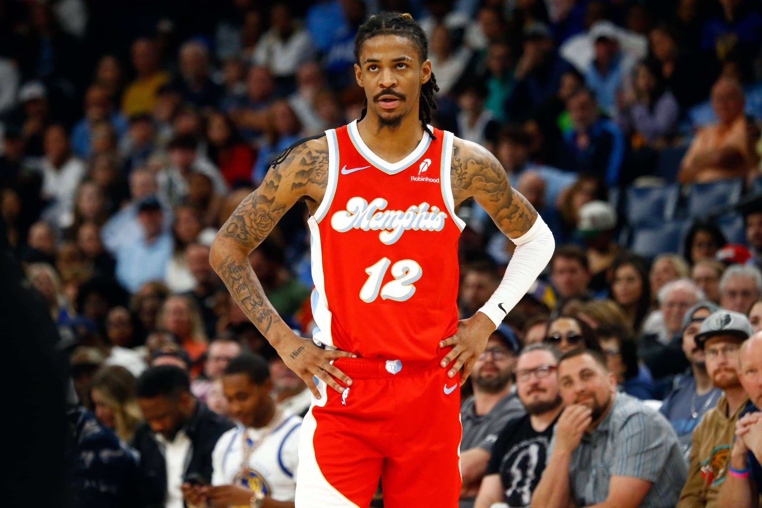 Apr 1, 2025; Memphis, Tennessee, USA; Memphis Grizzlies guard Ja Morant (12) looks on during the fourth quarter against the Golden State Warriors at FedExForum. Mandatory Credit: Petre Thomas-Imagn Images