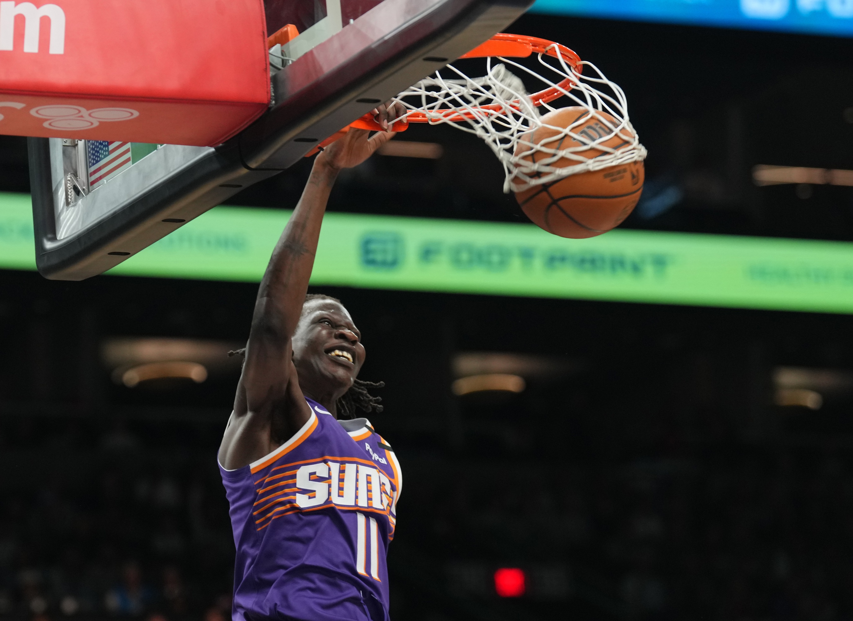 Phoenix Suns center Bol Bol (11) dunks against the Denver Nuggets during the first half at Footprint Center. Mandatory Credit: Joe Camporeale-Imagn Images