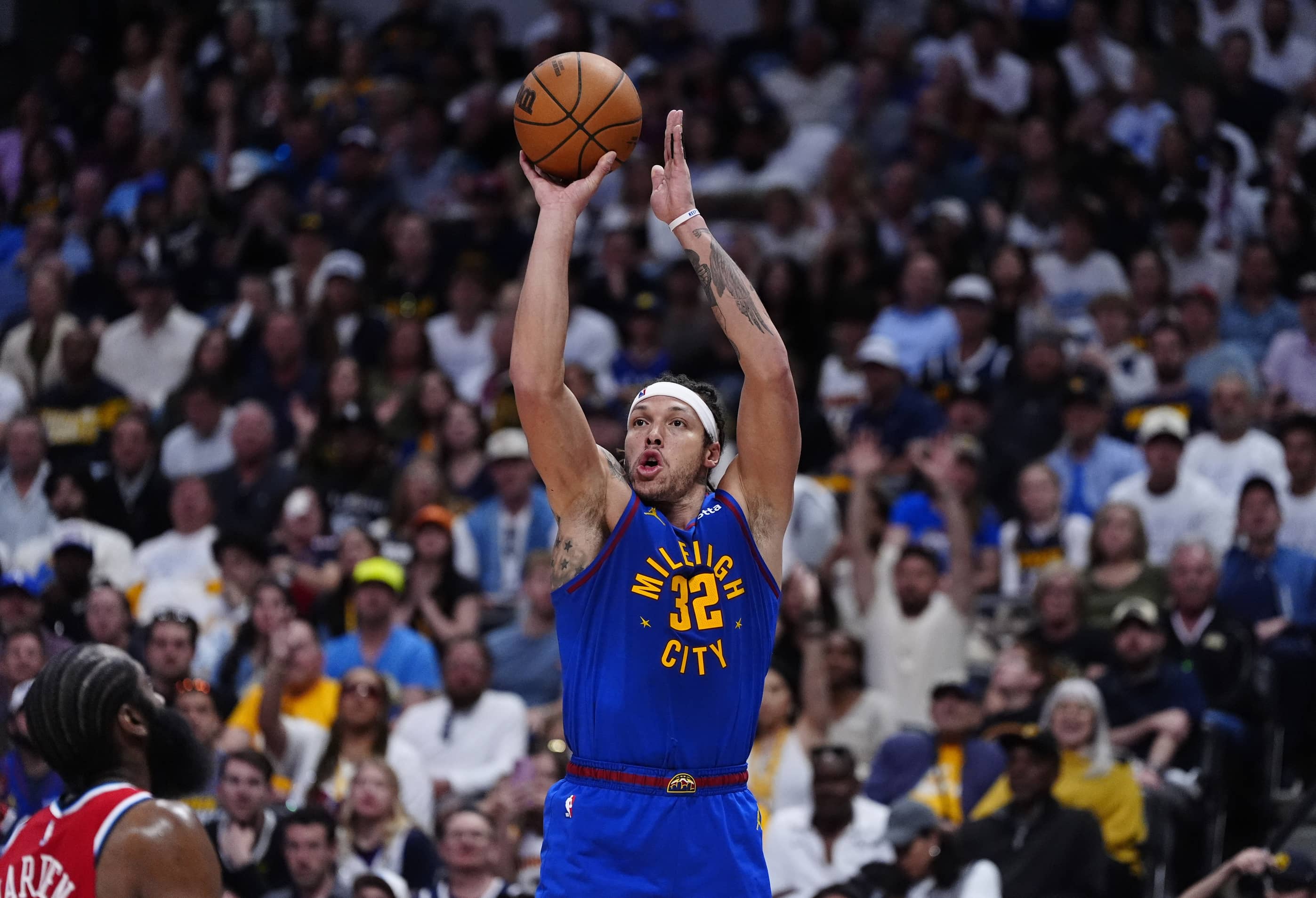 Denver, Colorado, USA; Denver Nuggets forward Aaron Gordon (32) shoots a three-pointer in the third quarter against the LA Clippers during game seven of the first round for the 2025 NBA Playoffs at Ball Arena. Mandatory Credit: Ron Chenoy-Imagn Images