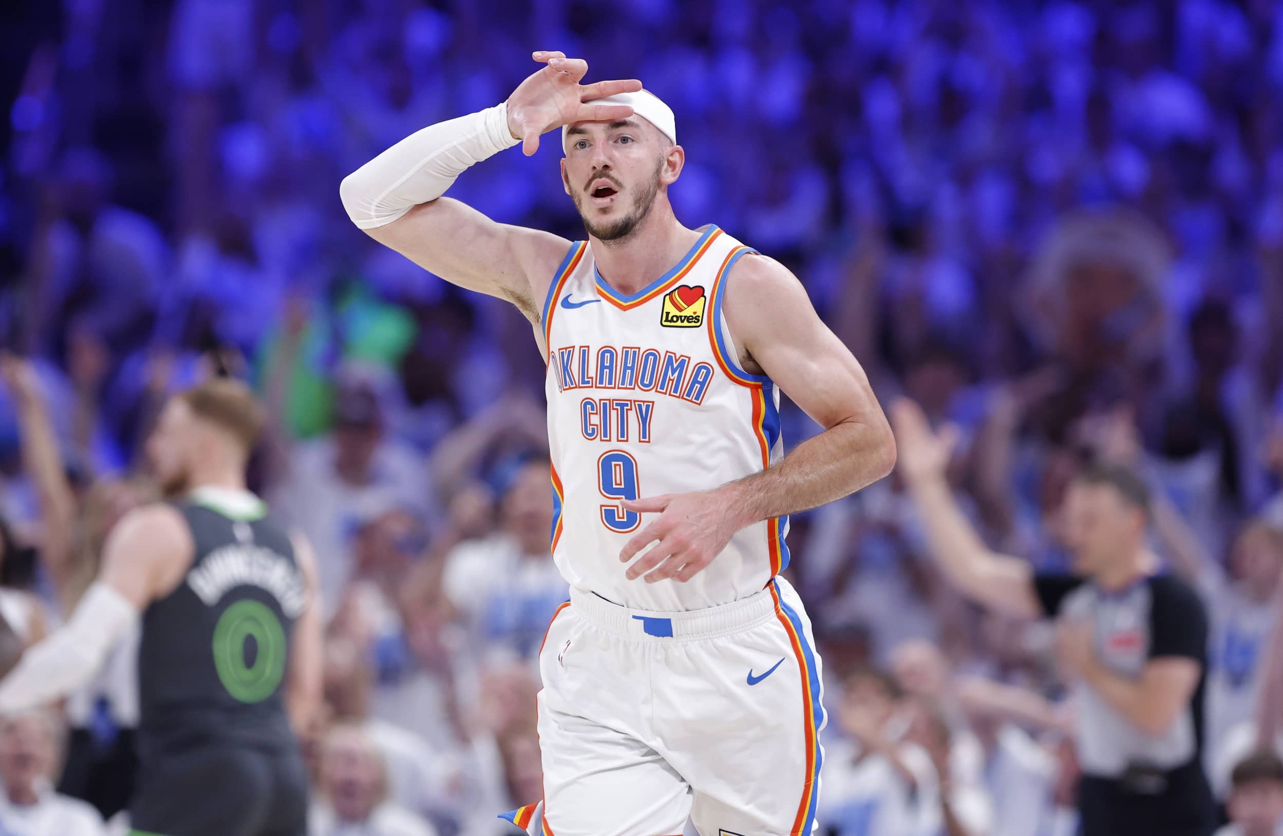 Oklahoma City, Oklahoma, USA; Oklahoma City Thunder guard Alex Caruso (9) reacts after scoring a three-point basket against the Minnesota Timberwolves in the second quarter during game one of the Western Conference Finals for the 2025 NBA Playoffs at Paycom Center. Mandatory Credit: Alonzo Adams-Imagn Images