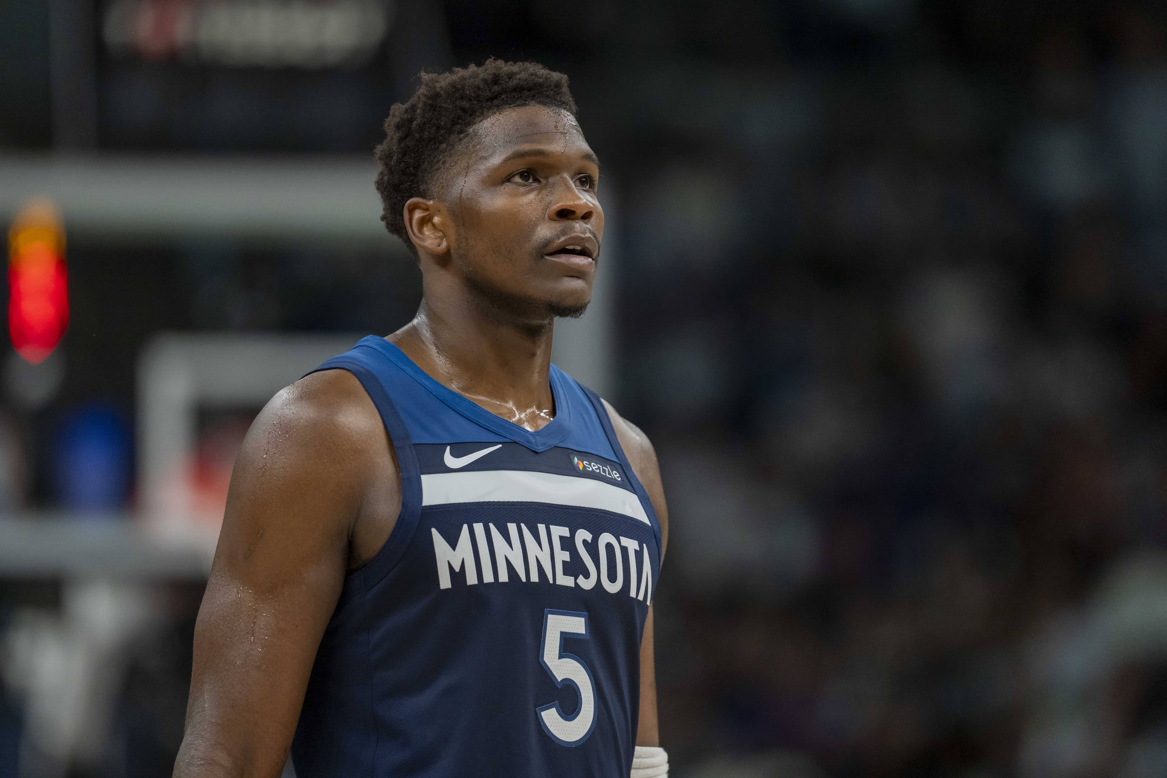 Minneapolis, Minnesota, USA; Minnesota Timberwolves guard Anthony Edwards (5) looks on against the Los Angeles Lakers in the second half during game three of first round for the 2024 NBA Playoffs at Target Center. Mandatory Credit: Jesse Johnson-Imagn Images