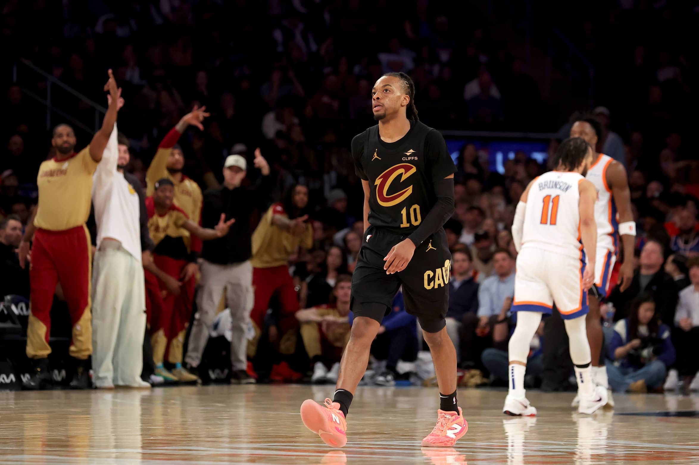 Apr 11, 2025; New York, New York, USA; Cleveland Cavaliers guard Darius Garland (10) and the Cavalier bench react after his three point shot against the New York Knicks during the fourth quarter at Madison Square Garden. Mandatory Credit: Brad Penner-Imagn Images