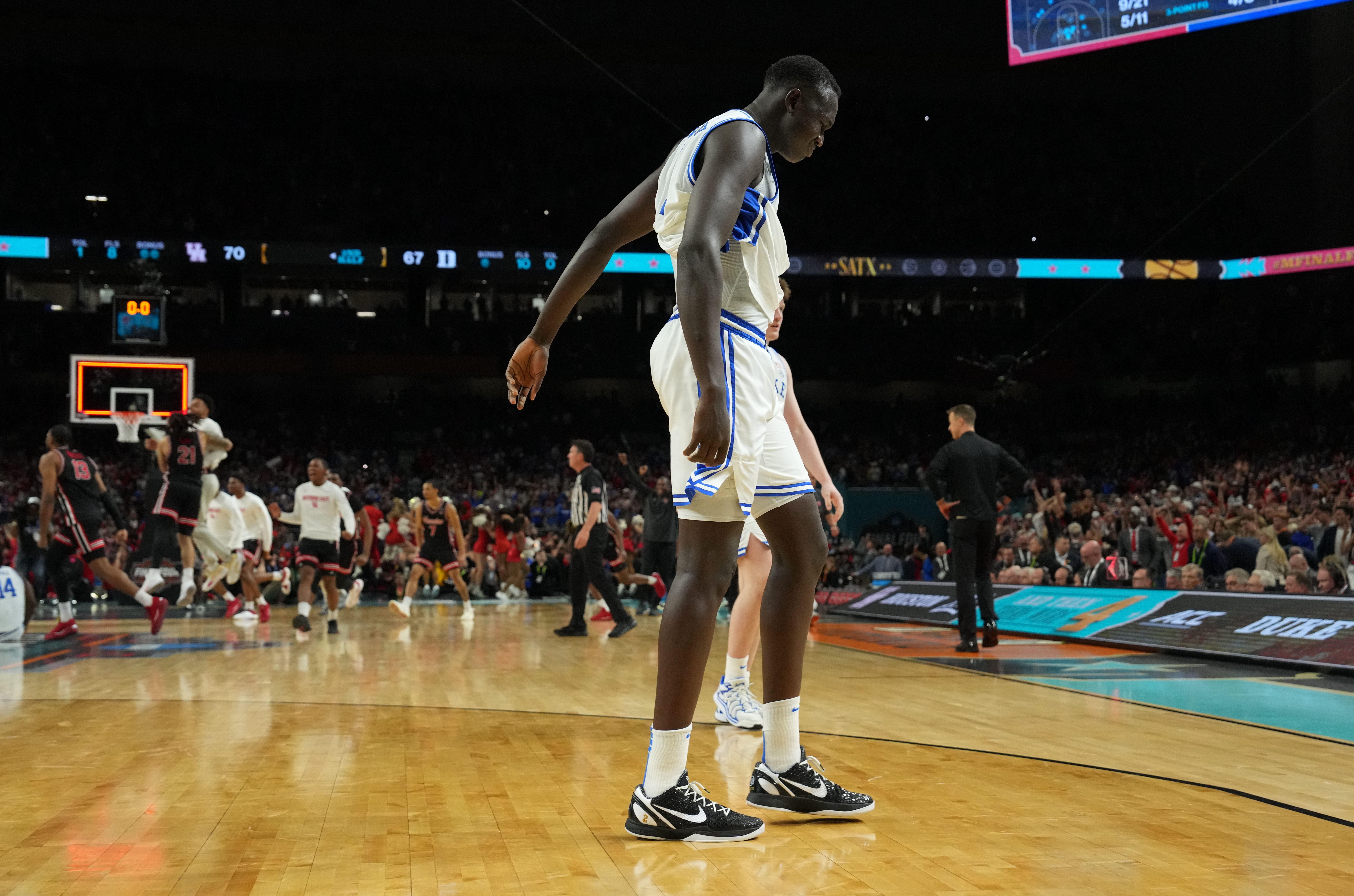 Apr 5, 2025; San Antonio, TX, USA; Duke Blue Devils center Khaman Maluach (9) reacts after their loss to the Houston Cougars in the semifinals of the men's Final Four of the 2025 NCAA Tournament at the Alamodome. Mandatory Credit: Bob Donnan-Imagn Images  