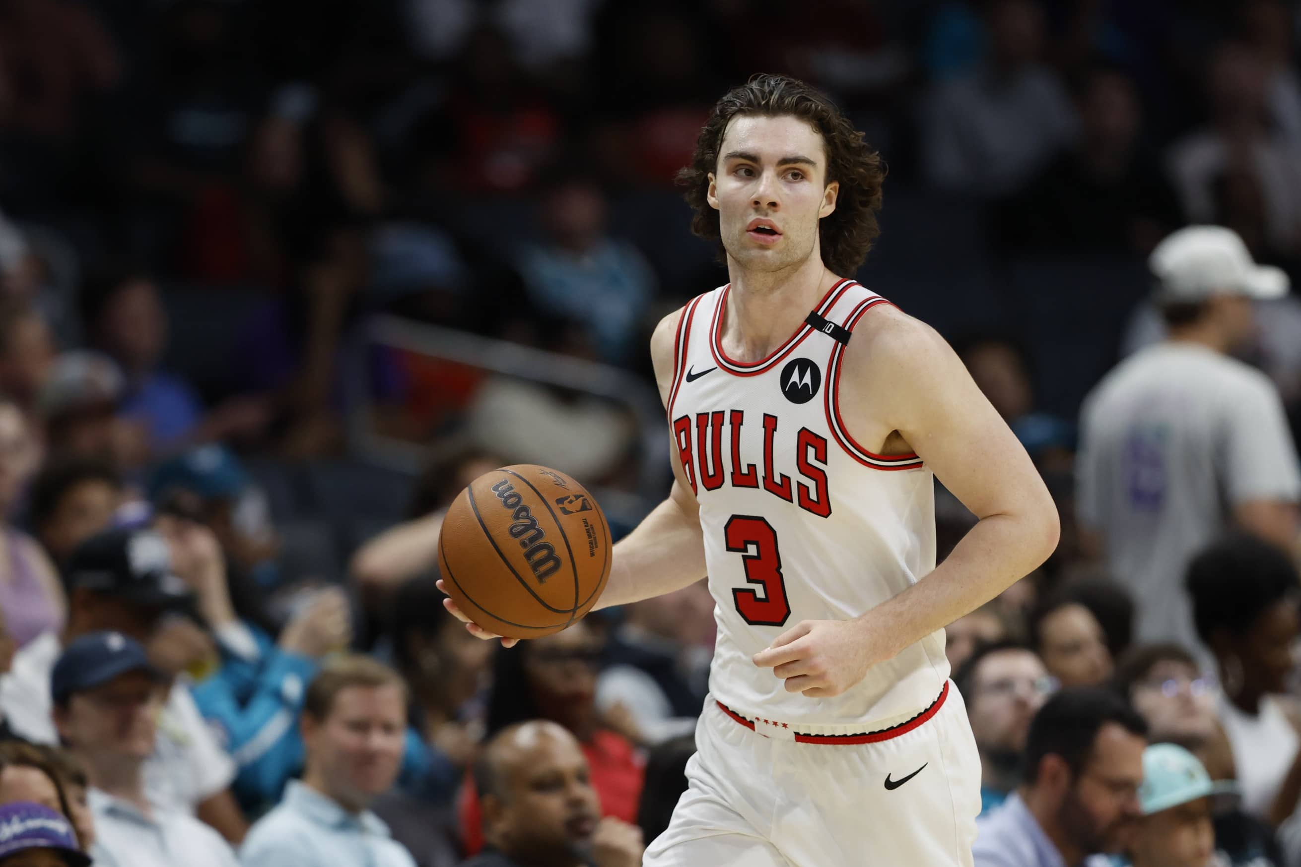 Apr 6, 2025; Charlotte, North Carolina, USA; Chicago Bulls guard Josh Giddey (3) brings the ball upcourt against the Charlotte Hornets during the second half at Spectrum Center. Mandatory Credit: Nell Redmond-Imagn Images