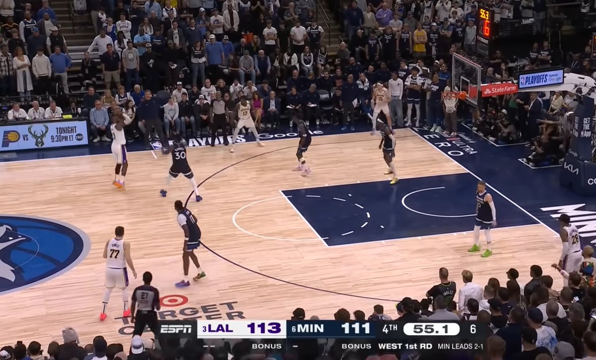 LeBron James attempts to shoot a three-pointer over Julius Randle