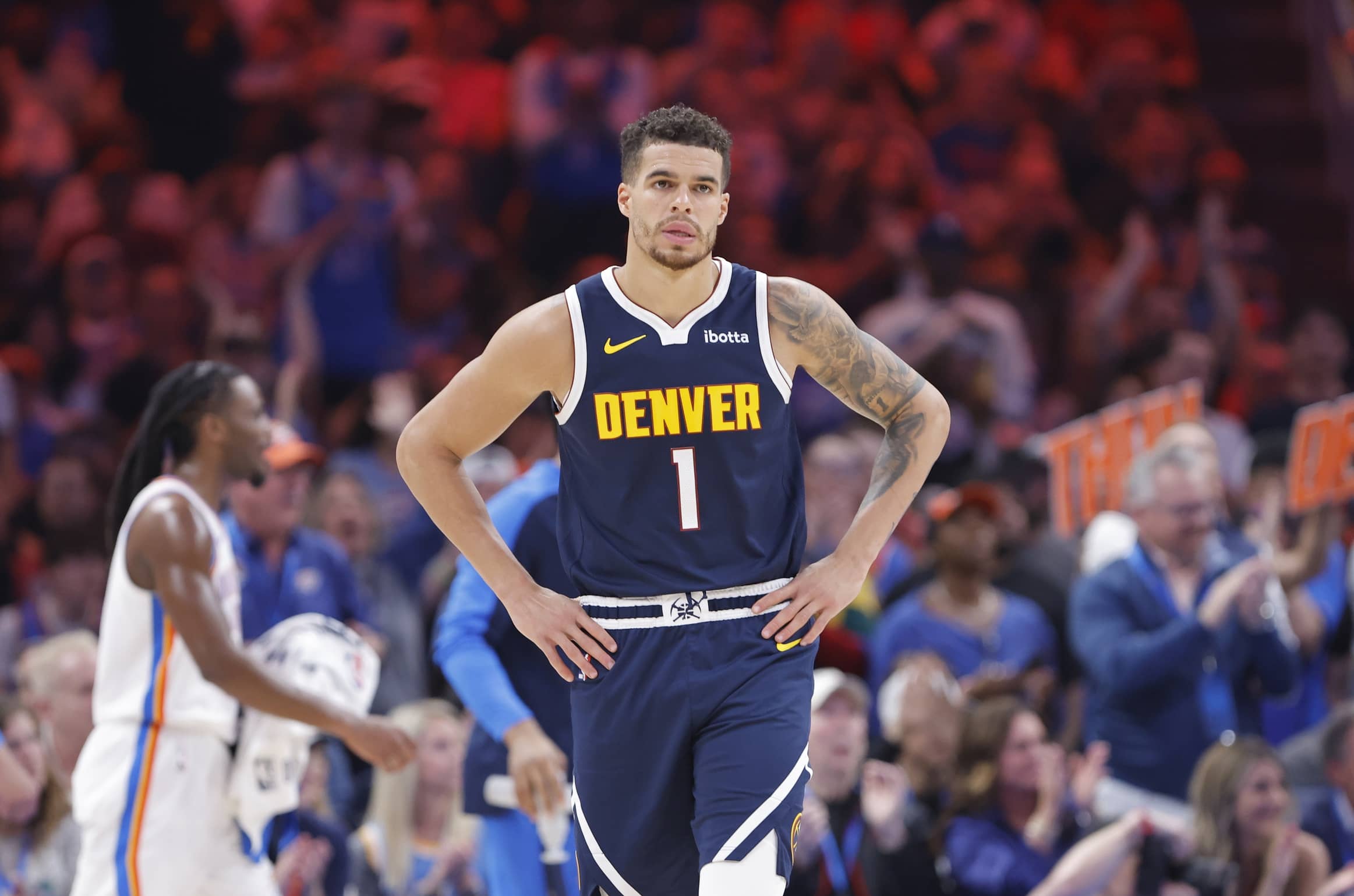 Mar 10, 2025; Oklahoma City, Oklahoma, USA; Denver Nuggets forward Michael Porter Jr. (1) walks down the court after a play against the Oklahoma City Thunder during the second quarter at Paycom Center. Mandatory Credit: Alonzo Adams-Imagn Images