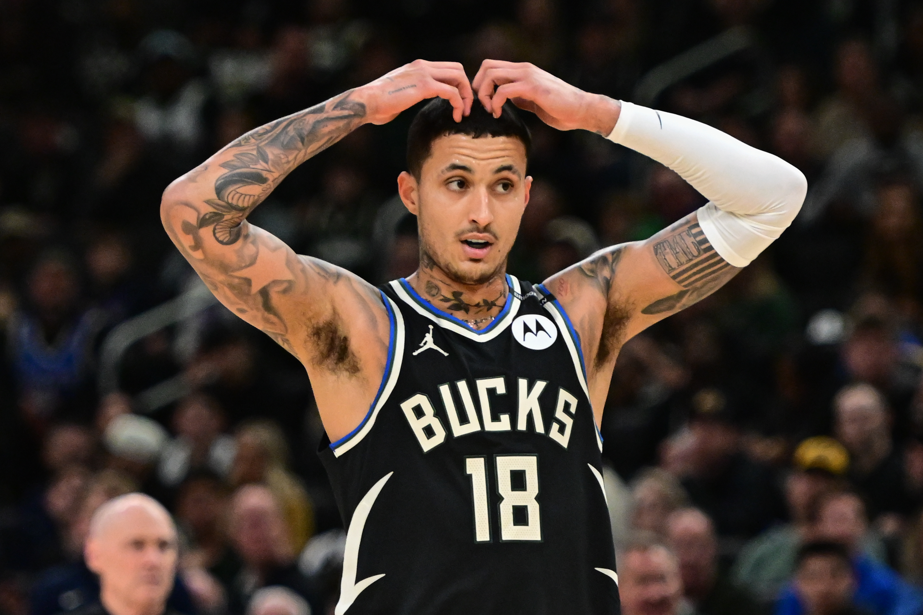 Apr 27, 2025; Milwaukee, Wisconsin, USA; Milwaukee Bucks forward Kyle Kuzma (18) reacts in the third quarter against the Indiana Pacers during game four of first round for the 2024 NBA Playoffs at Fiserv Forum. Mandatory Credit: Benny Sieu-Imagn Images  