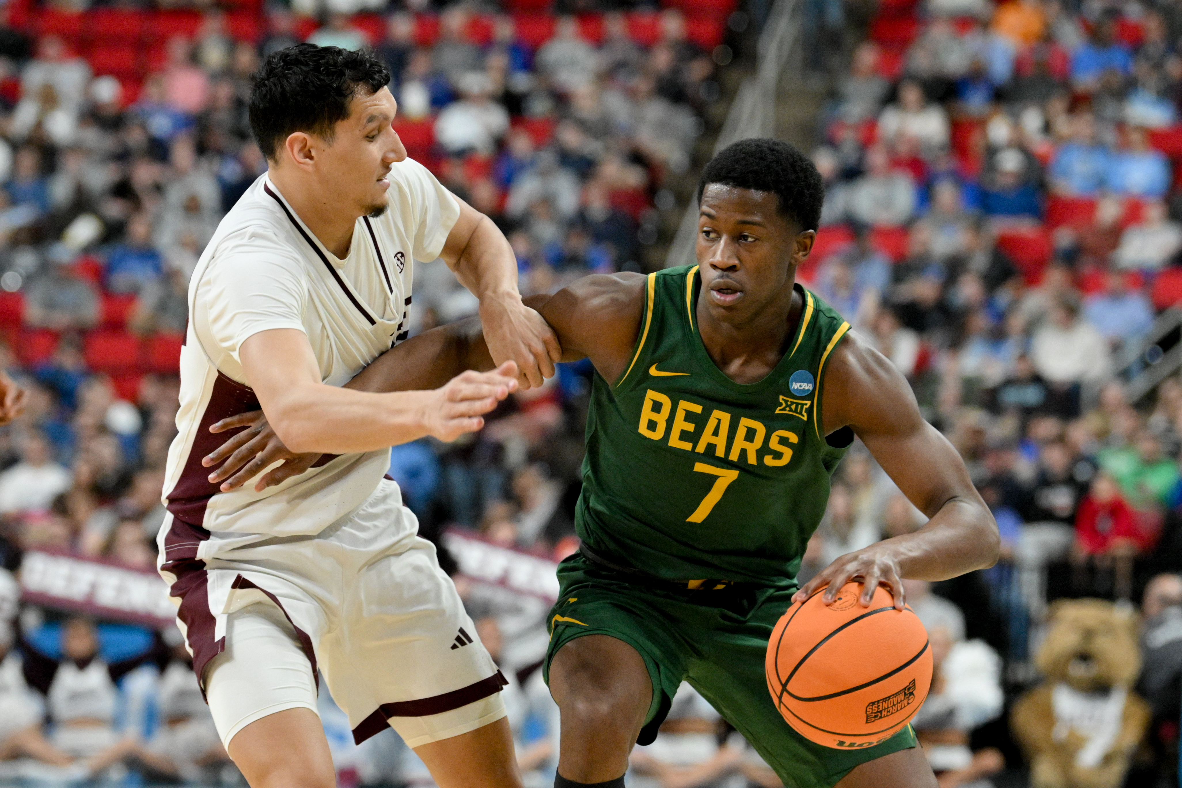Mar 21, 2025; Raleigh, NC, USA; Mississippi State Bulldogs forward RJ Melendez (22) defends against Baylor Bears guard VJ Edgecombe (7) during the second half in the first round of the NCAA Tournament at Lenovo Center. Mandatory Credit: Zachary Taft-Imagn Images  
