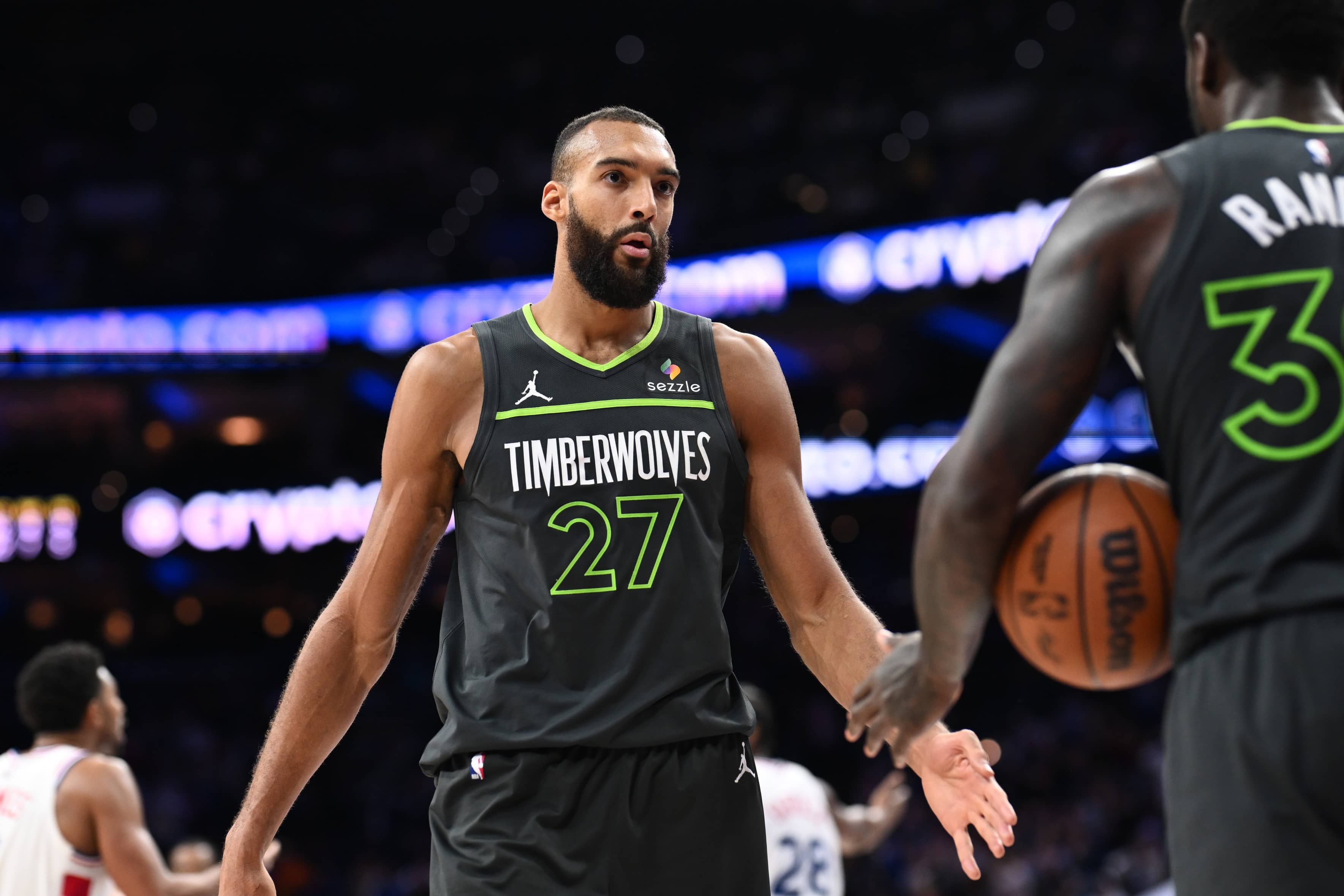 Philadelphia, Pennsylvania, USA; Minnesota Timberwolves center Rudy Gobert (27) looks on against the Philadelphia 76ers in the fourth quarter at Wells Fargo Center. Mandatory Credit: Kyle Ross-Imagn Images