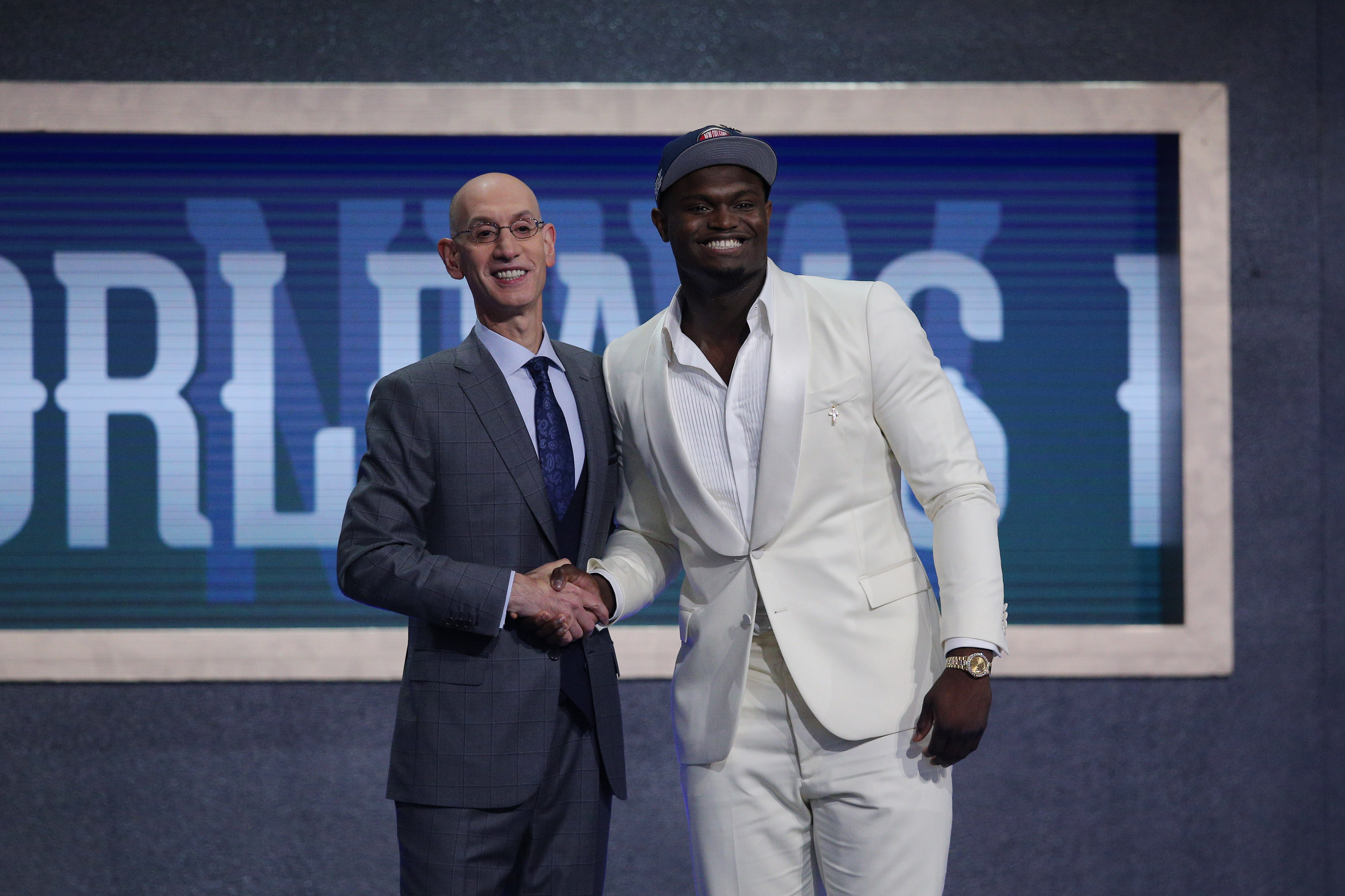 Jun 20, 2019; Brooklyn, NY, USA; Zion Williamson (Duke) greets NBA commissioner Adam Silver after being selected as the number one overall pick to the New Orleans Pelicans in the first round of the 2019 NBA Draft at Barclays Center. Mandatory Credit: Brad Penner-Imagn Images  