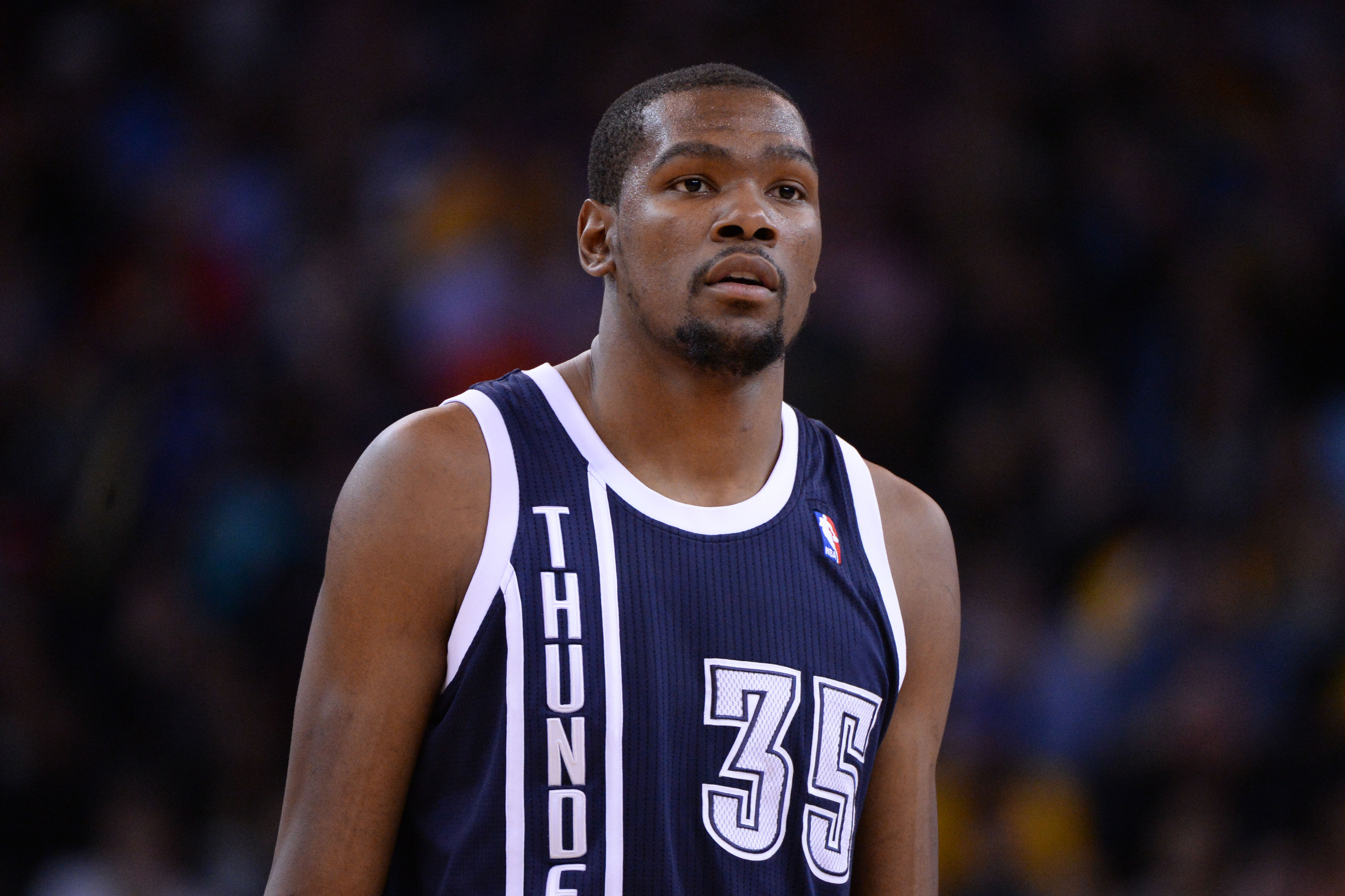 April 11, 2013; Oakland, CA, USA; Oklahoma City Thunder small forward Kevin Durant (35) looks on during the second quarter against the Golden State Warriors at Oracle Arena. The City Thunder defeated the Warriors 116-97. Mandatory Credit: Kyle Terada-Imagn Images  