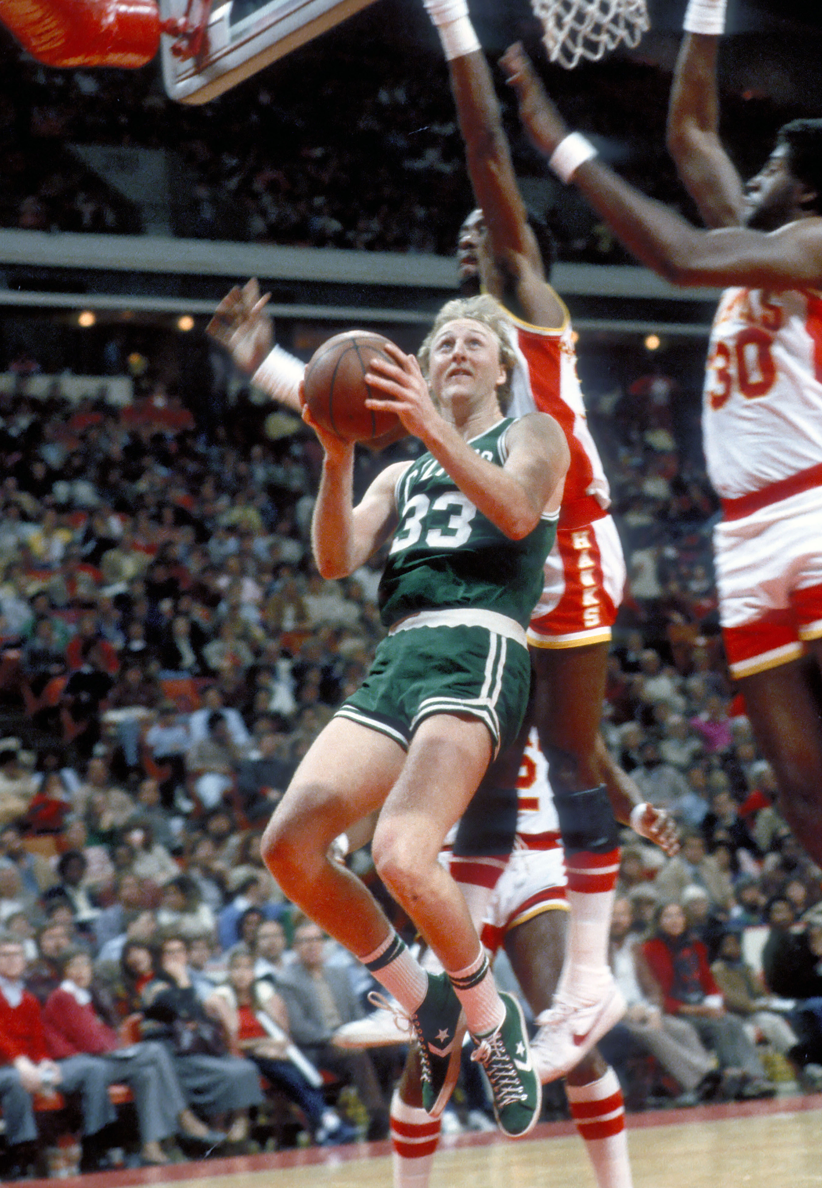 Dec 1981; Atlanta, GA, USA; FILE PHOTO; Boston Celtics forward Larry Bird (33) in action against the Atlanta Hawks during the 1981-82 season at the Omni. Mandatory Credit: Photo By Malcolm Emmons-Imagn Images (c) Copyright Malcolm Emmons  