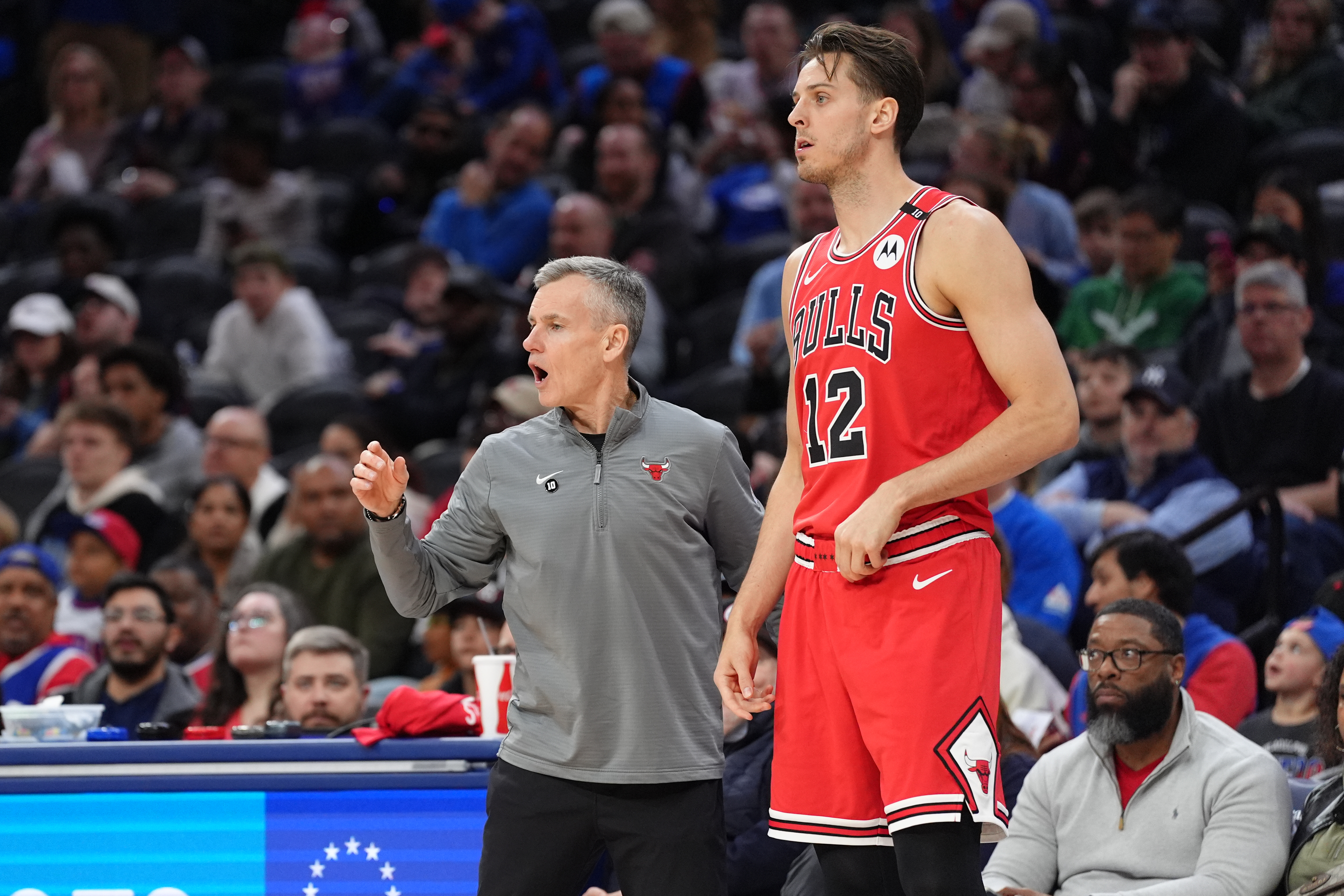 Apr 13, 2025; Philadelphia, Pennsylvania, USA; Chicago Bulls head coach Billy Donovan reacts with forward Zach Collins (12) against the Philadelphia 76ers in the third quarter at Wells Fargo Center. Mandatory Credit: Kyle Ross-Imagn Images  