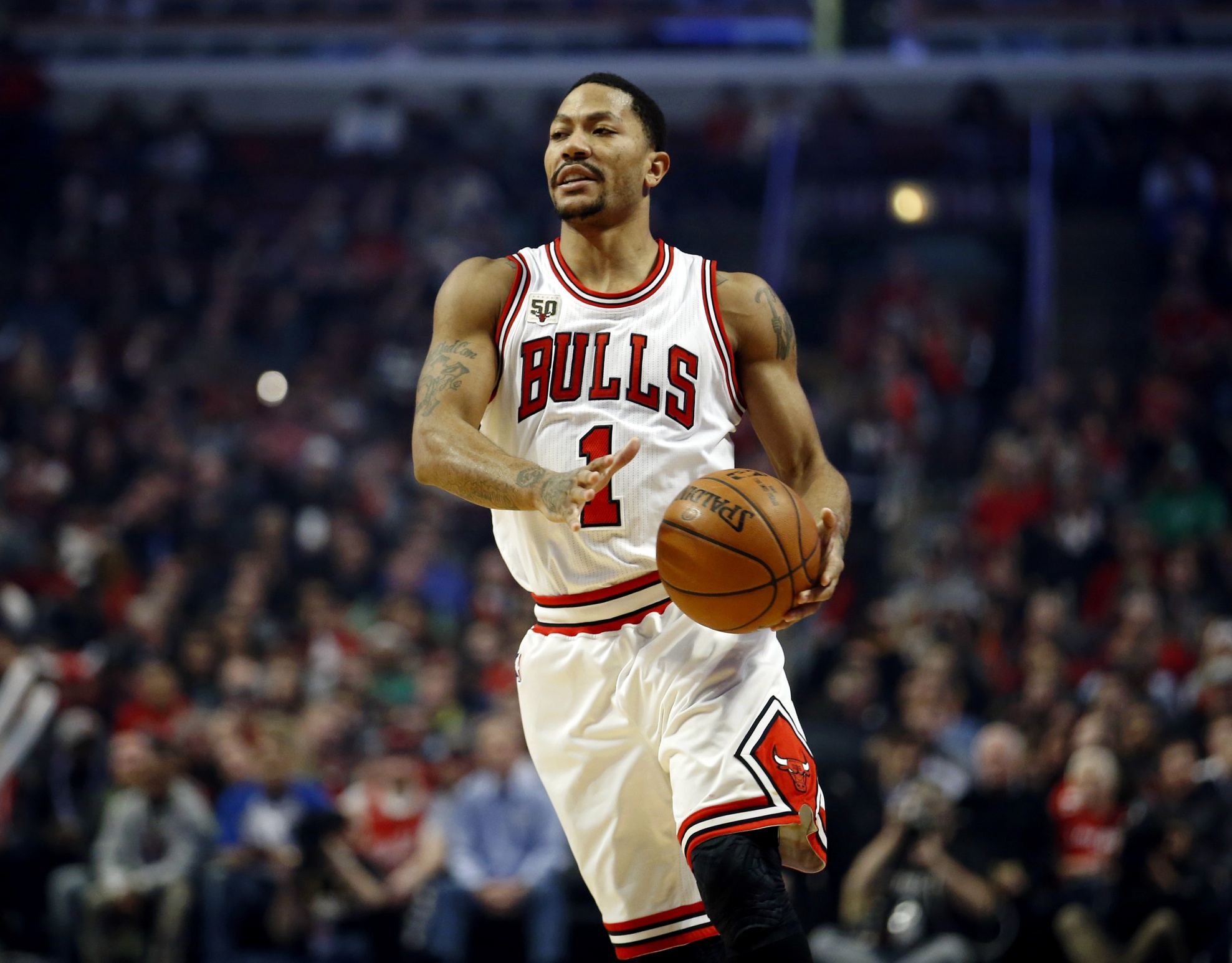 Chicago, IL, USA; Chicago Bulls guard Derrick Rose (1) brings the ball up court against the Boston Celtics during the second half at United Center. Mandatory Credit: Kamil Krzaczynski-Imagn Images