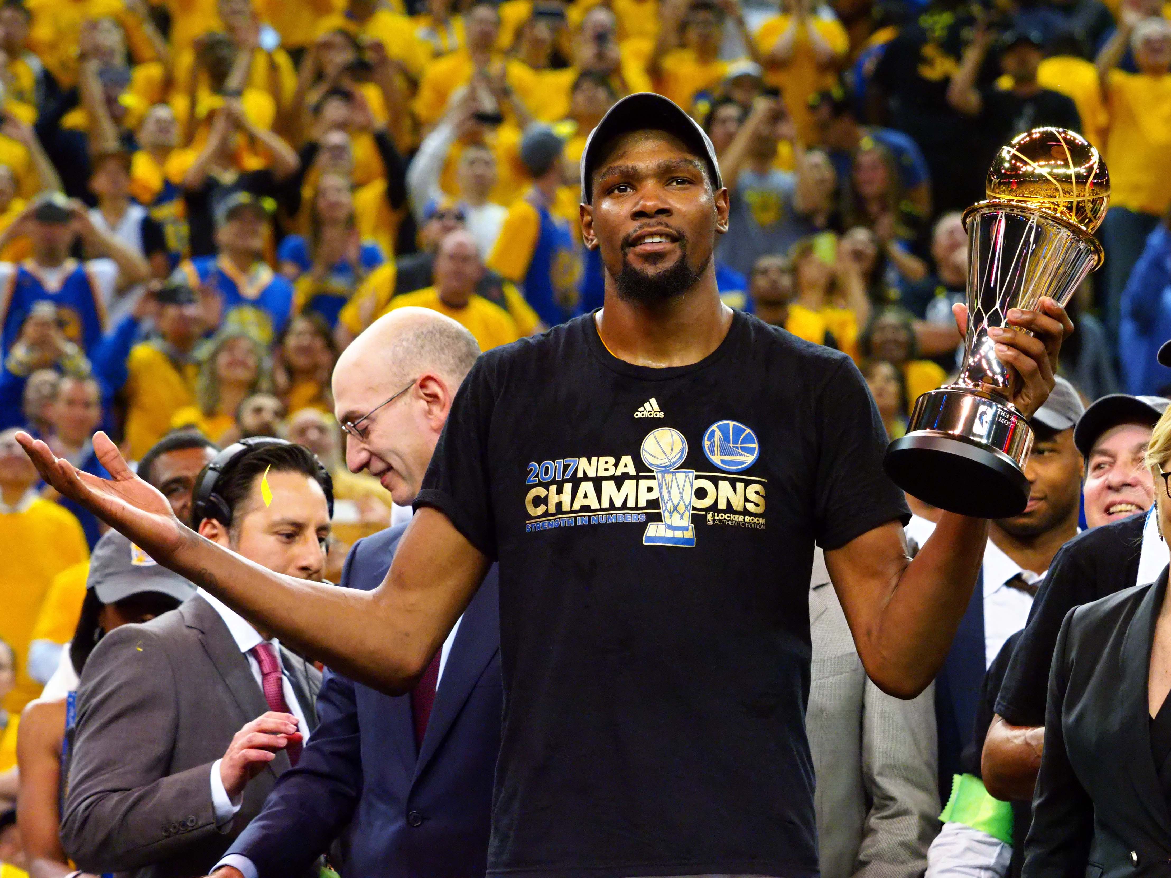 Jun 12, 2017; Oakland, CA, USA; Golden State Warriors forward Kevin Durant (35) celebrates after winning the NBA Finals MVP in game five of the 2017 NBA Finals at Oracle Arena. Mandatory Credit: Kelley L Cox-Imagn Images