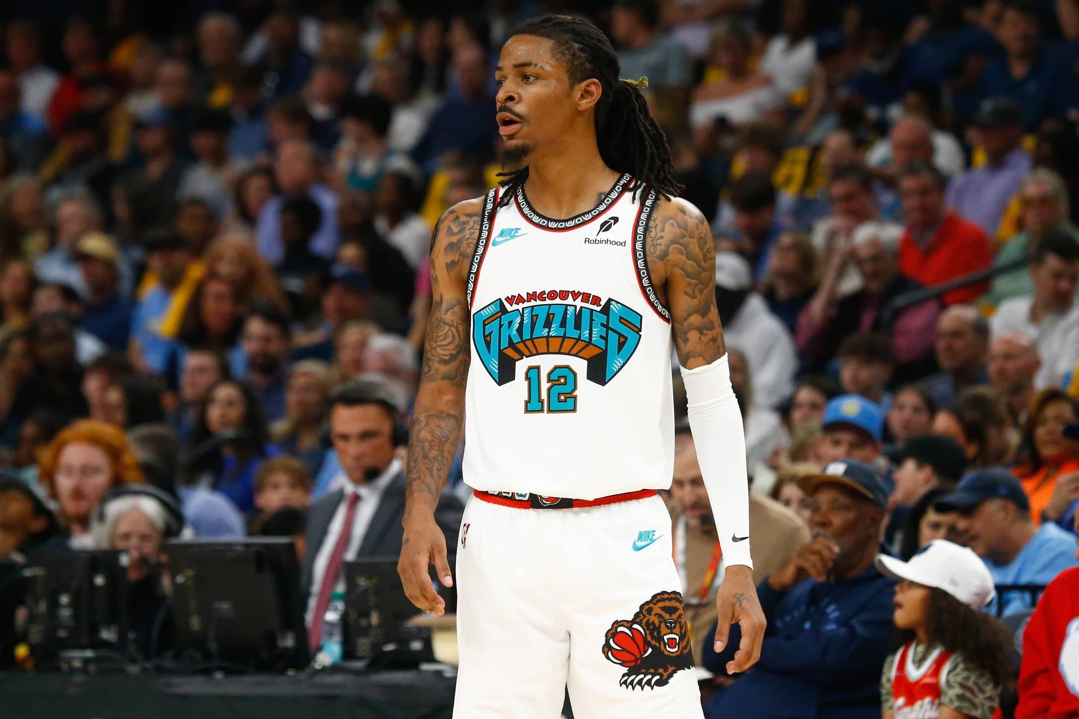 Memphis Grizzlies guard Ja Morant (12) looks on during the second quarter against the Dallas Mavericks at FedExForum.