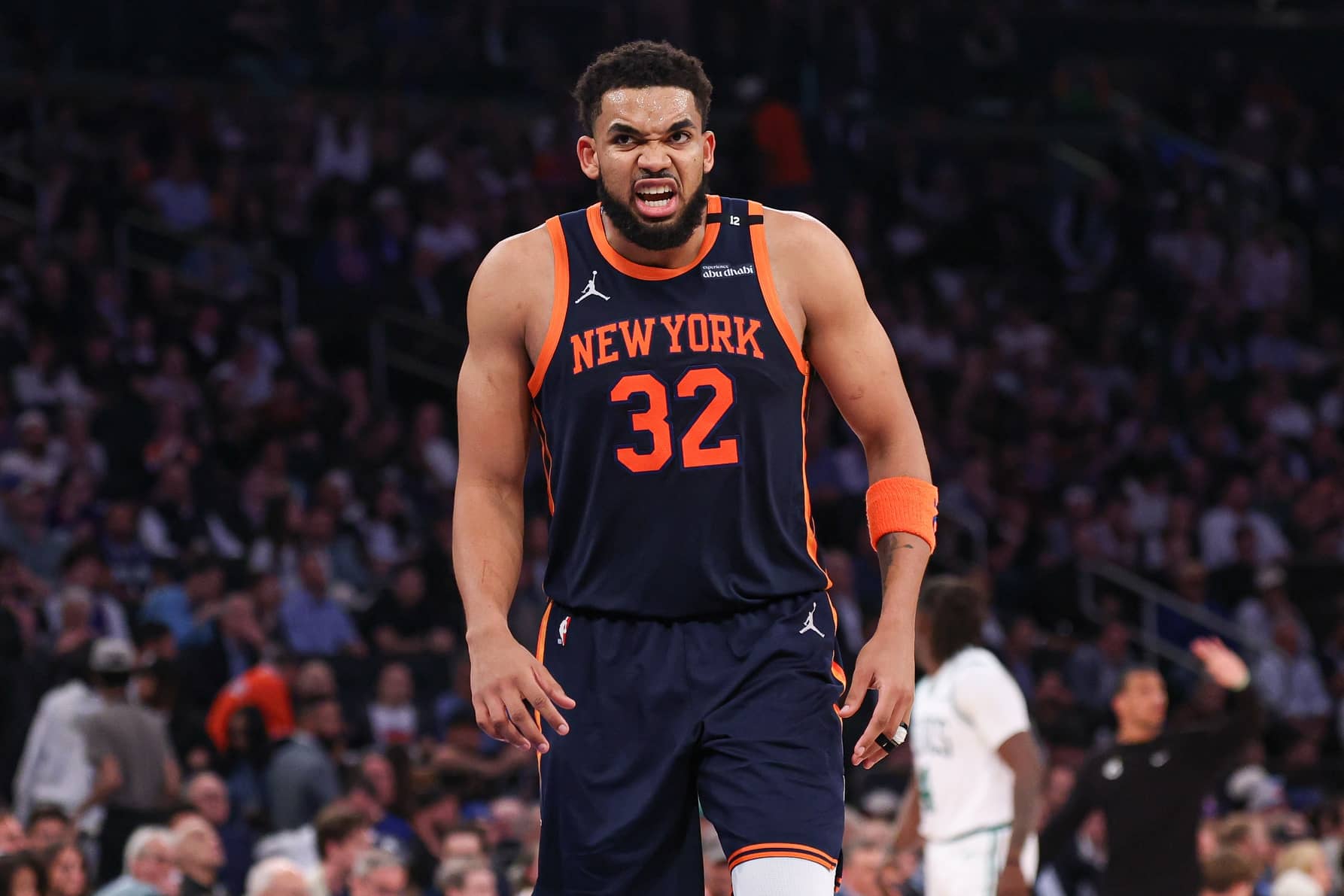 New York Knicks center Karl-Anthony Towns (32) reacts after a dunk in the second half during game four of the second round for the 2025 NBA Playoffs against the Boston Celtics at Madison Square Garden.