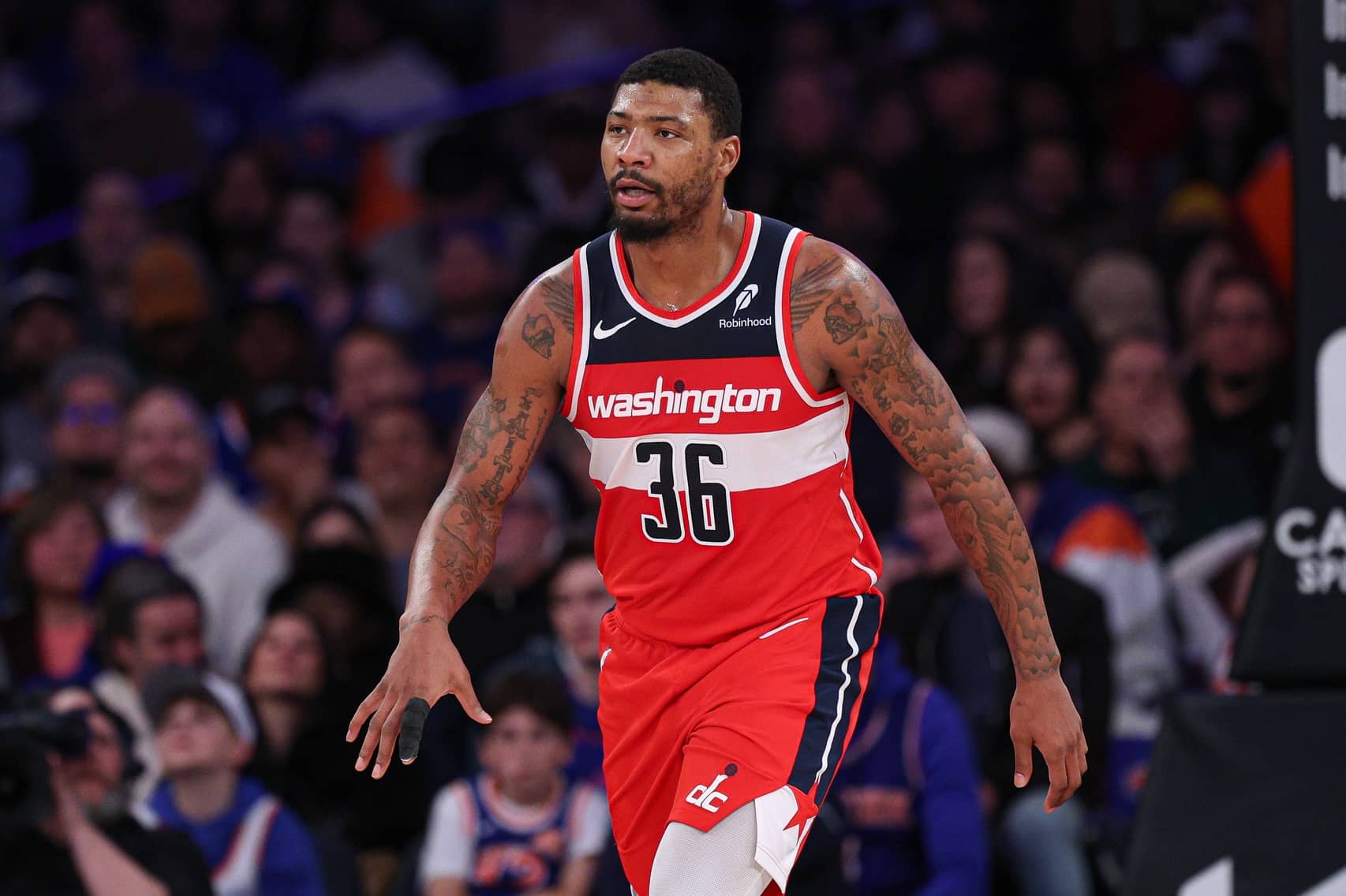 New York, New York, USA; Washington Wizards guard Marcus Smart (36) reacts after a basket against the New York Knicks during the second half at Madison Square Garden. Mandatory Credit: Vincent Carchietta-Imagn Images