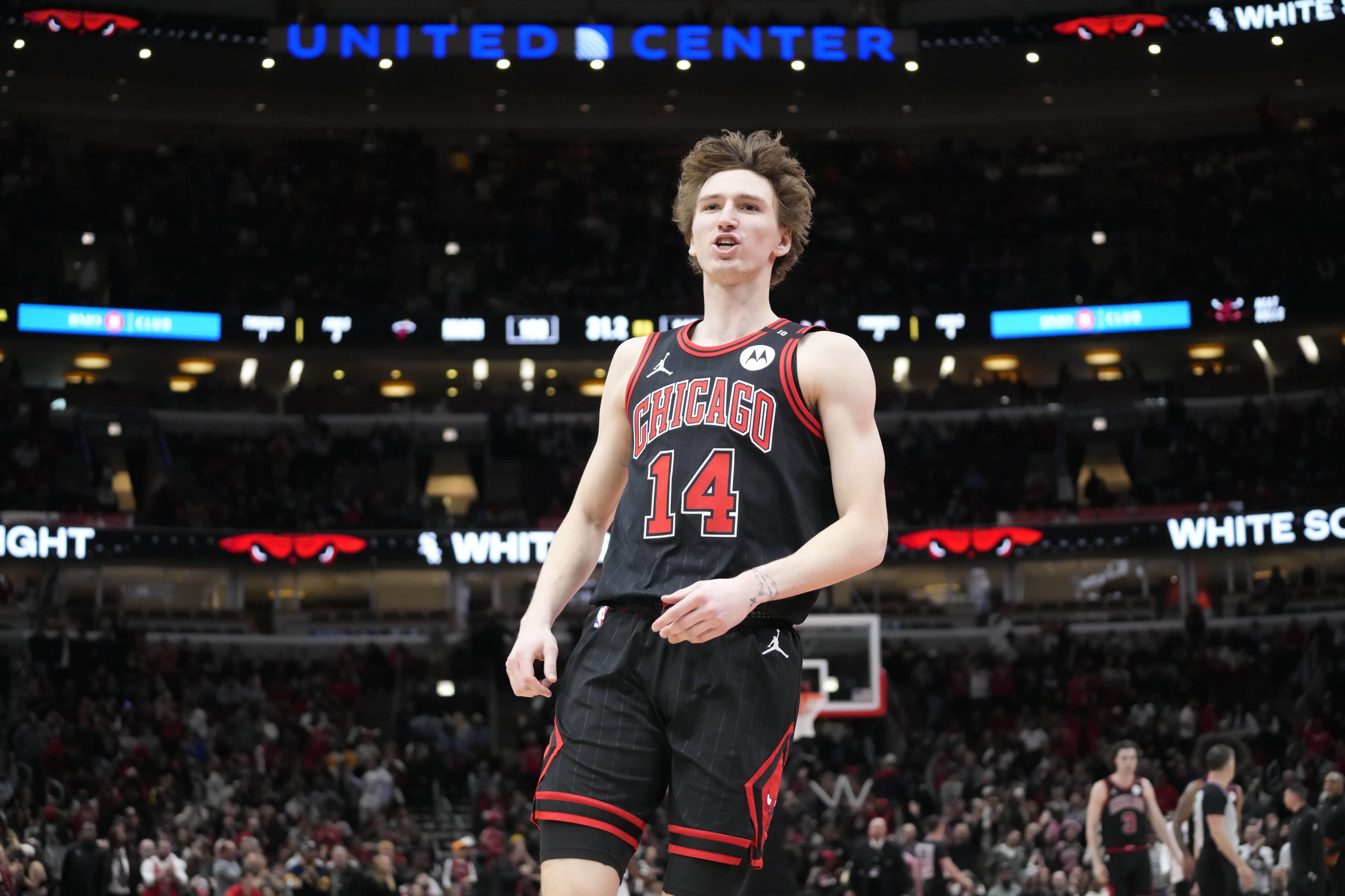 Chicago, Illinois, USA; Chicago Bulls forward Matas Buzelis (14) celebrates his three-point basket against the Miami Heat during the second half at United Center. Mandatory Credit: David Banks-Imagn Images