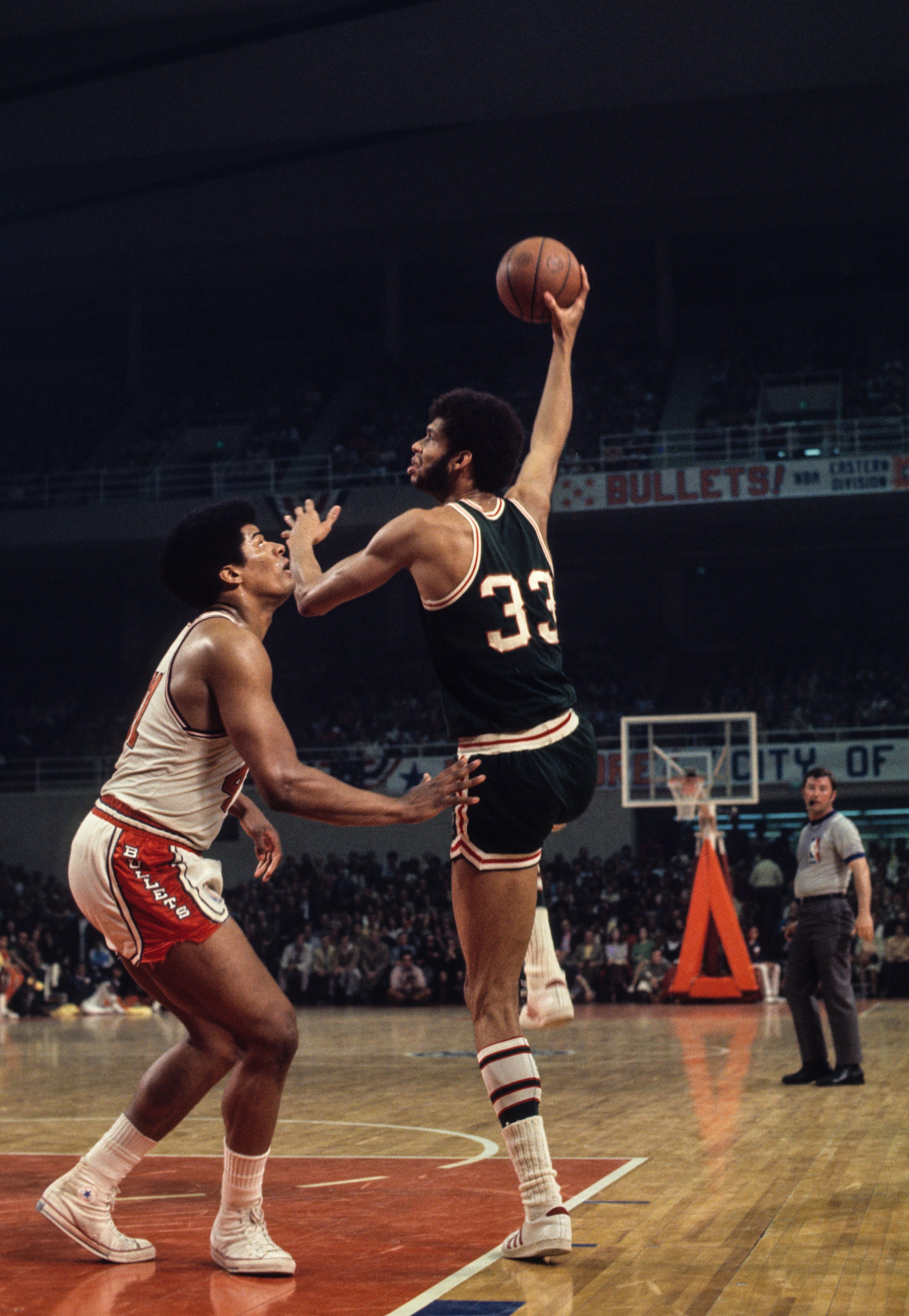 May 1971; Baltimore, Maryland, USA; FILE PHOTO; Milwaukee Bucks center Kareem Abdul-Jabbar (33) against the Baltimore Bullets at the Baltimore Civic Center. Mandatory Credit: Malcolm Emmons-USA TODAY Network.  