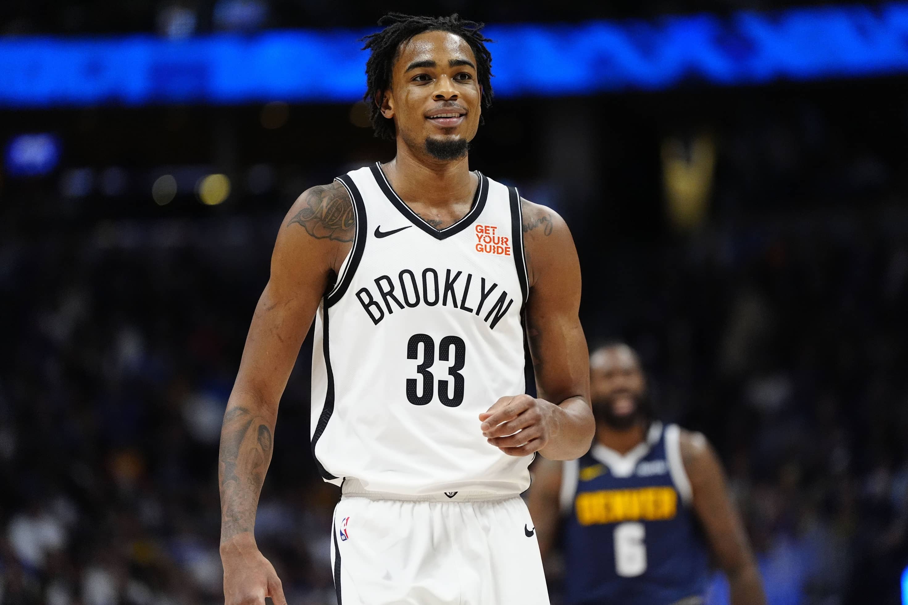 Brooklyn Nets center Nic Claxton (33) reacts in the second quarter against the Denver Nuggets at Ball Arena.