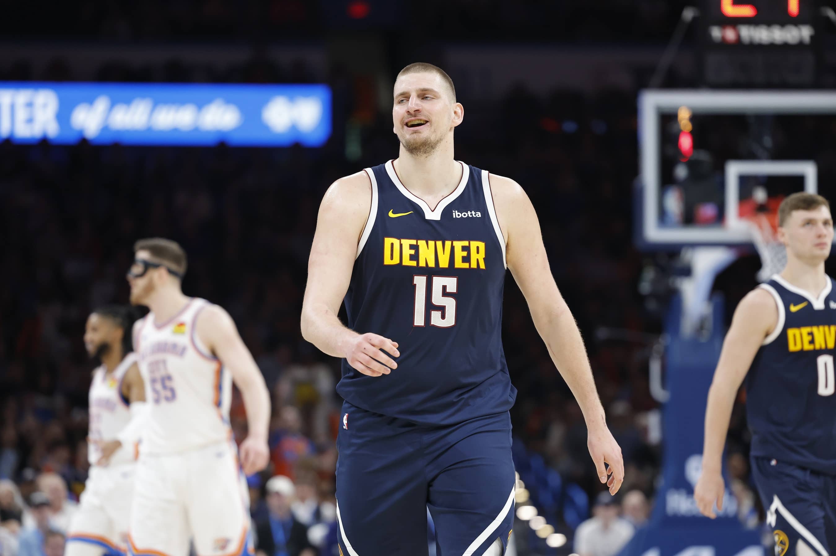 Denver Nuggets center Nikola Jokic (15) smiles after a play against the Oklahoma City Thunder during the second half at Paycom Center.