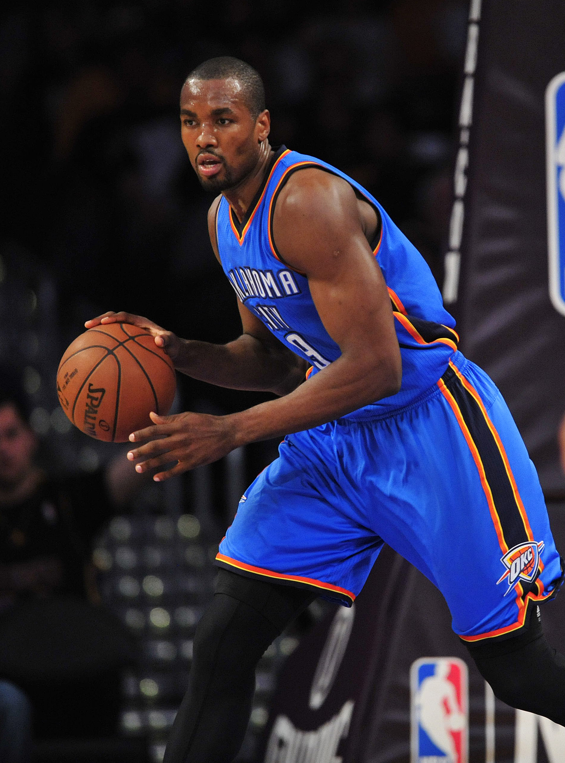 March 1, 2015; Los Angeles, CA, USA; Oklahoma City Thunder forward Serge Ibaka (9) moves the ball up court against the Los Angeles Lakers during the first half at Staples Center. Mandatory Credit: Gary A. Vasquez-Imagn Images  