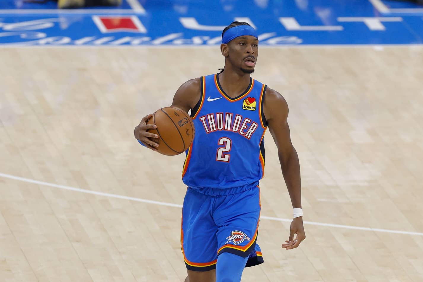 Jun 8, 2025; Oklahoma City, Oklahoma, USA; Oklahoma City Thunder guard Shai Gilgeous-Alexander (2) brings the ball up court against the Indiana Pacers during the first quarter of game two of the 2025 NBA Finals at Paycom Center. Mandatory Credit: Alonzo Adams-Imagn Images