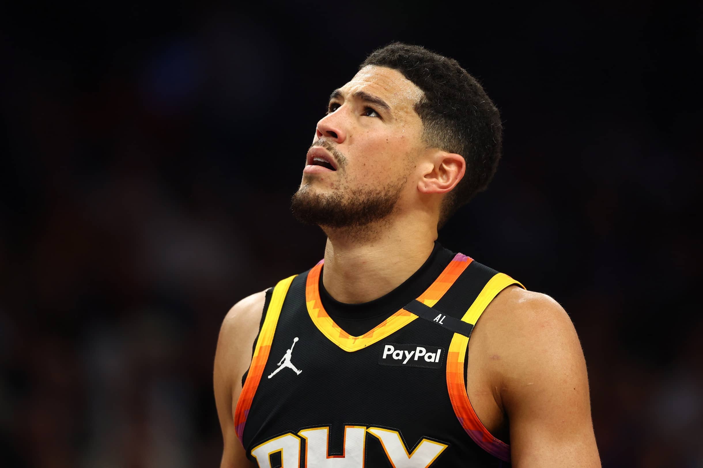 Phoenix Suns guard Devin Booker (1) reacts after a play against the Oklahoma City Thunder during the first half at Footprint Center.