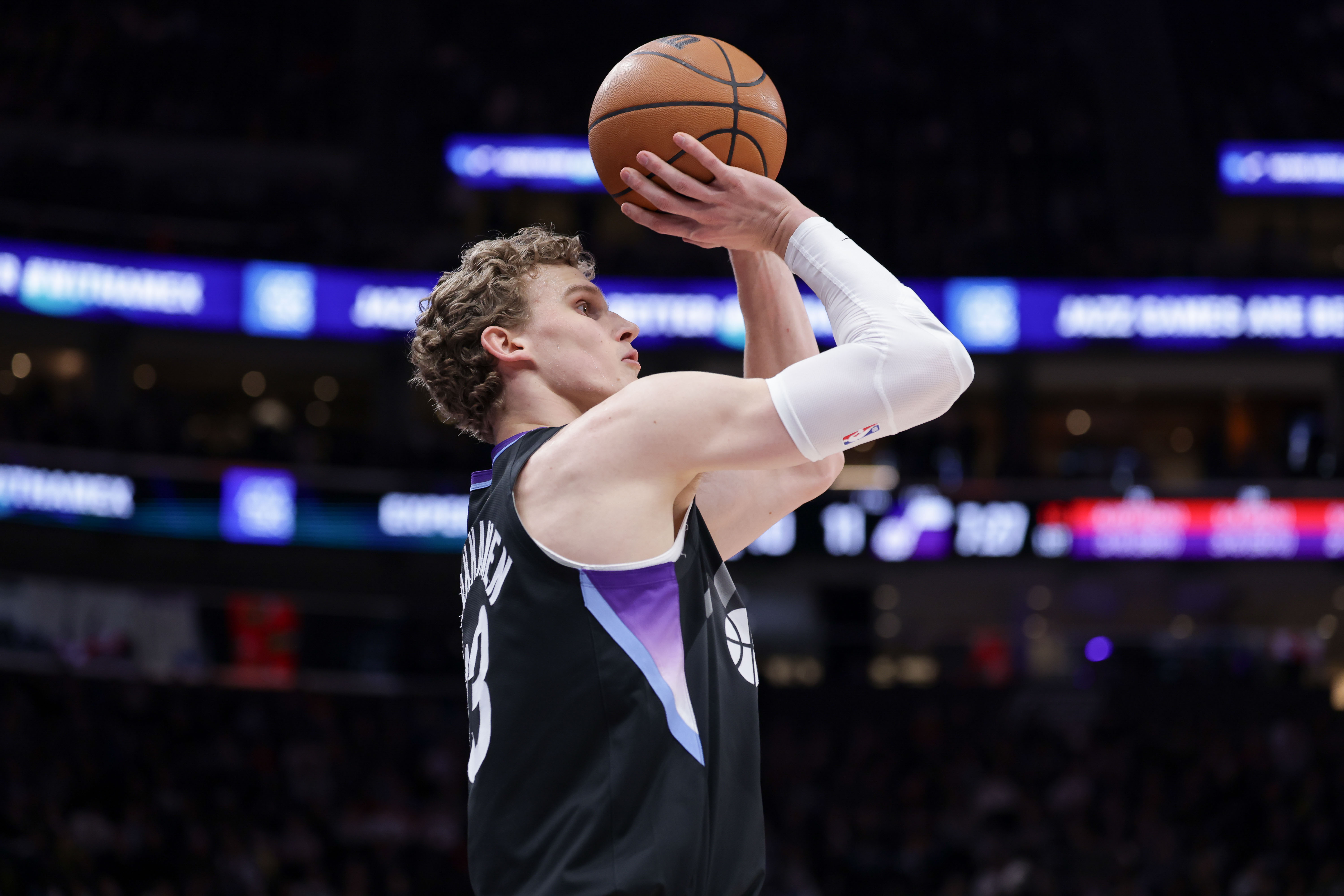 Mar 14, 2025; Salt Lake City, Utah, USA; Utah Jazz forward Lauri Markkanen (23) shoots a three point basket during the first quarter against the Toronto Raptors at Delta Center. Mandatory Credit: Chris Nicoll-Imagn Images  