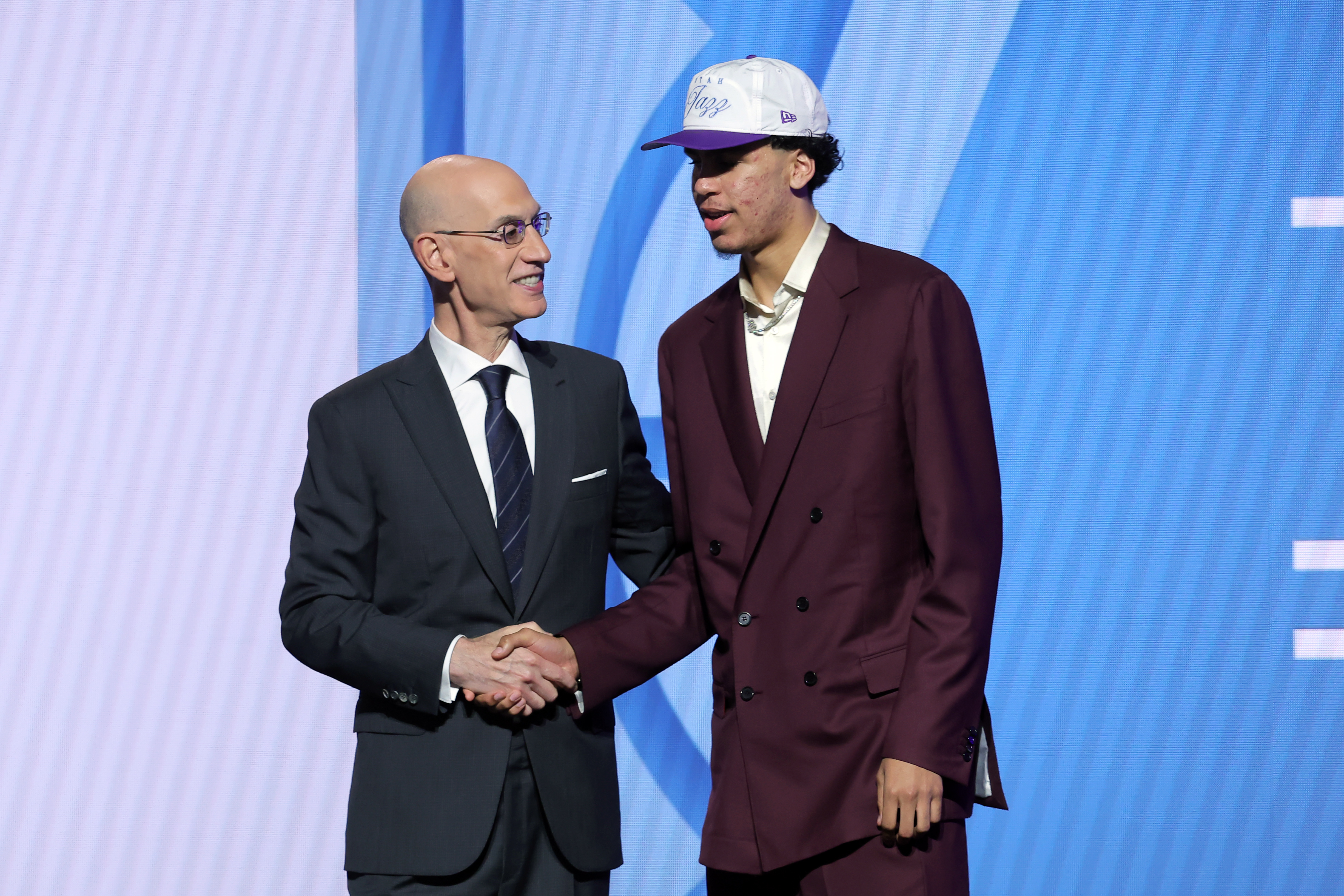 Jun 25, 2025; Brooklyn, NY, USA; Will Riley stands with NBA commissioner Adam Silver after being selected as the 21st pick by the Utah Jazz in the first round of the 2025 NBA Draft at Barclays Center. Mandatory Credit: Brad Penner-Imagn Images  