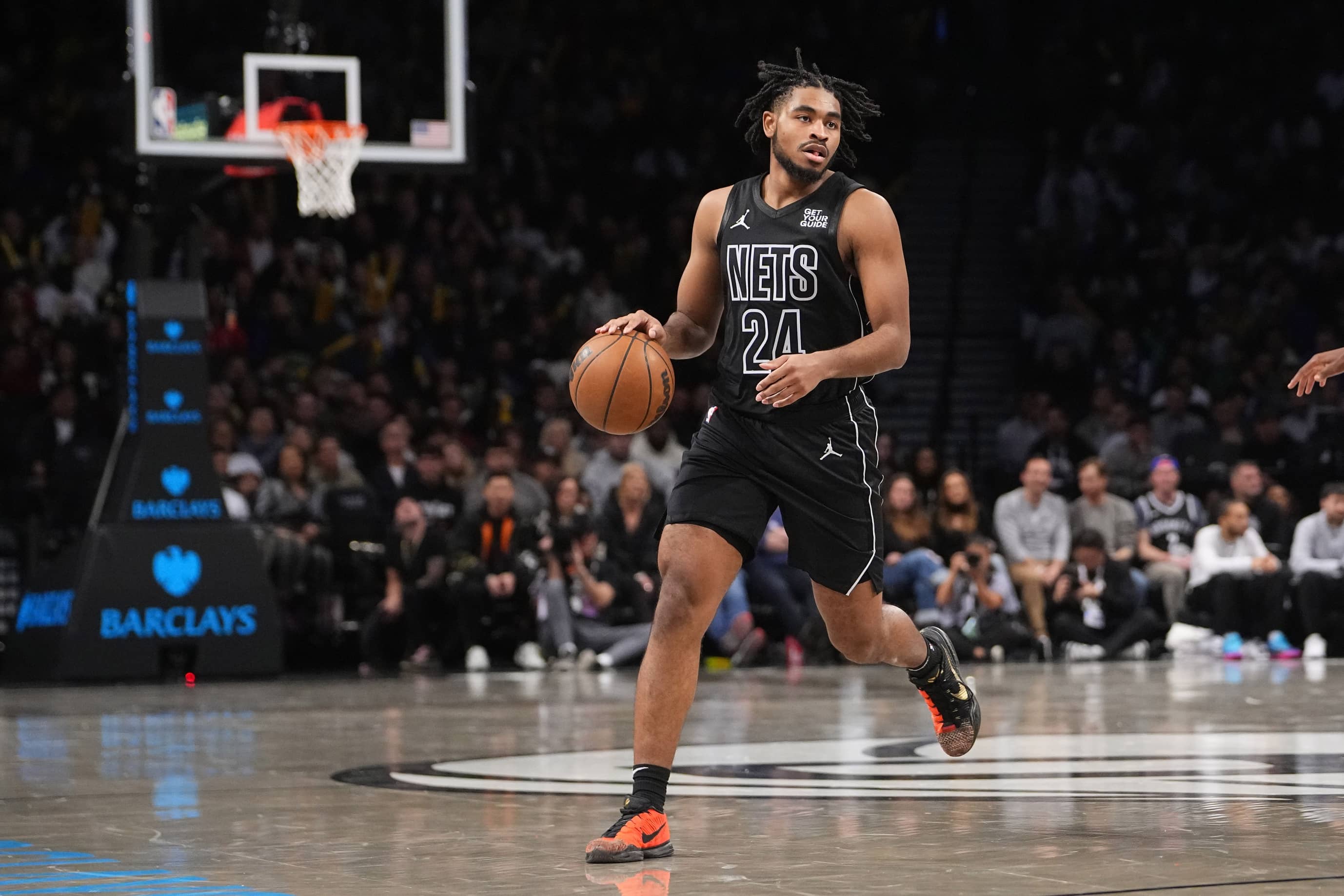 Brooklyn, New York, USA; Brooklyn Nets small guard Cam Thomas (24) dribbles the ball against the Denver Nuggets during the second half at Barclays Center. Mandatory Credit: Gregory Fisher-Imagn Images