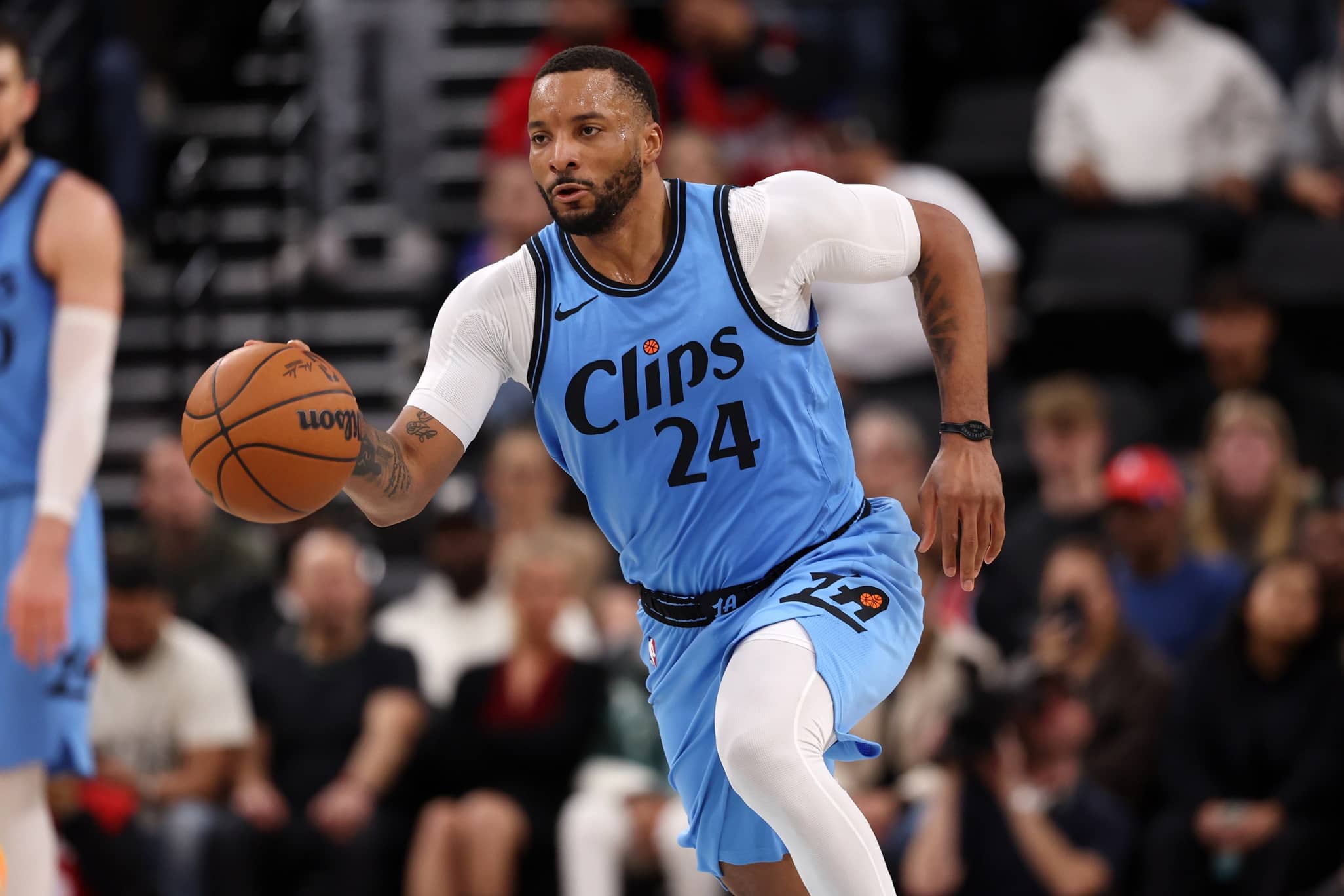 Los Angeles Clippers guard Norman Powell (24) brings the ball up court during the third quarter against the Utah Jazz at Intuit Dome.