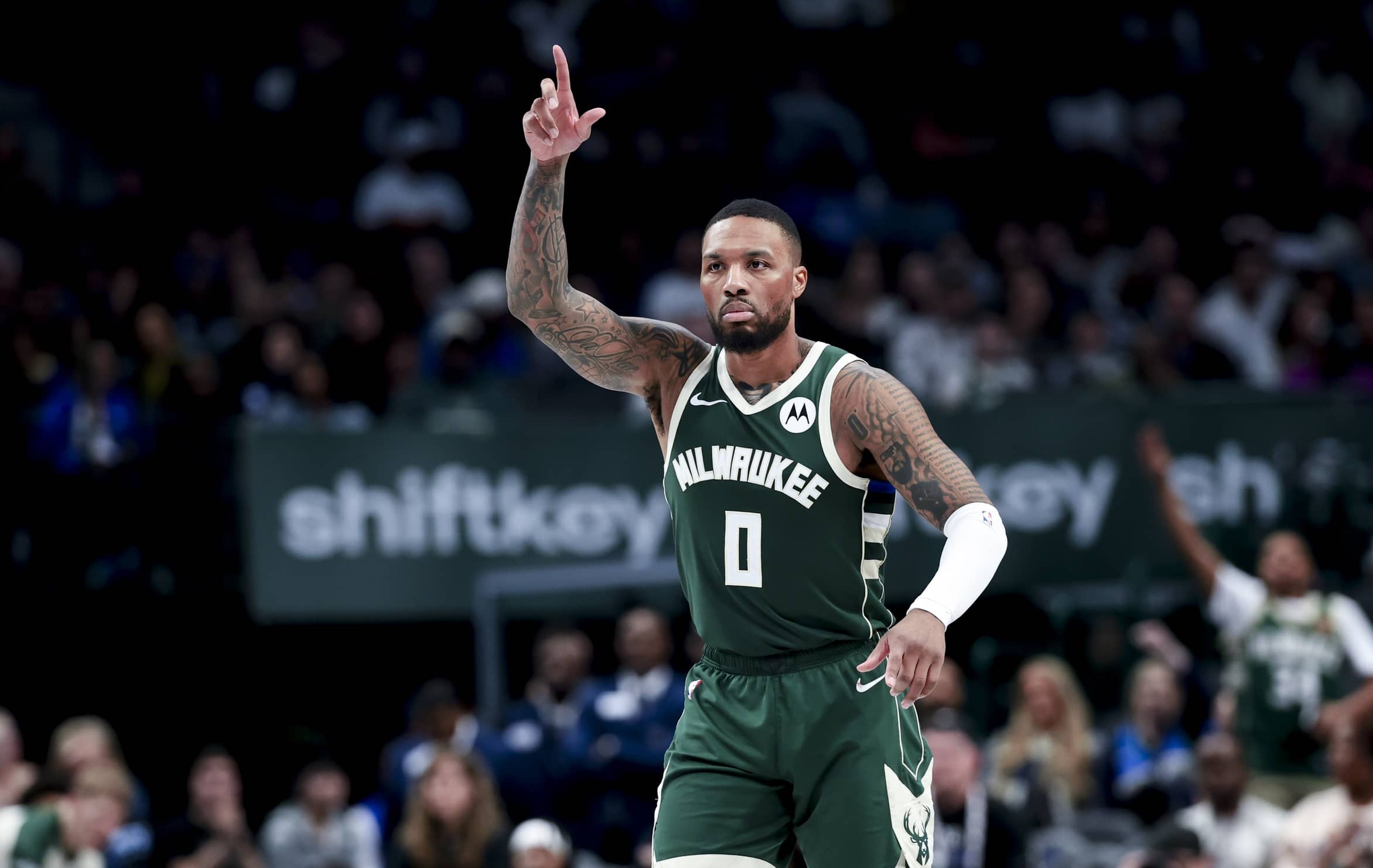 Mar 1, 2025; Dallas, Texas, USA; Milwaukee Bucks guard Damian Lillard (0) reacts after scoring against the Dallas Mavericks during the second half at American Airlines Center. Mandatory Credit: Kevin Jairaj-Imagn Images