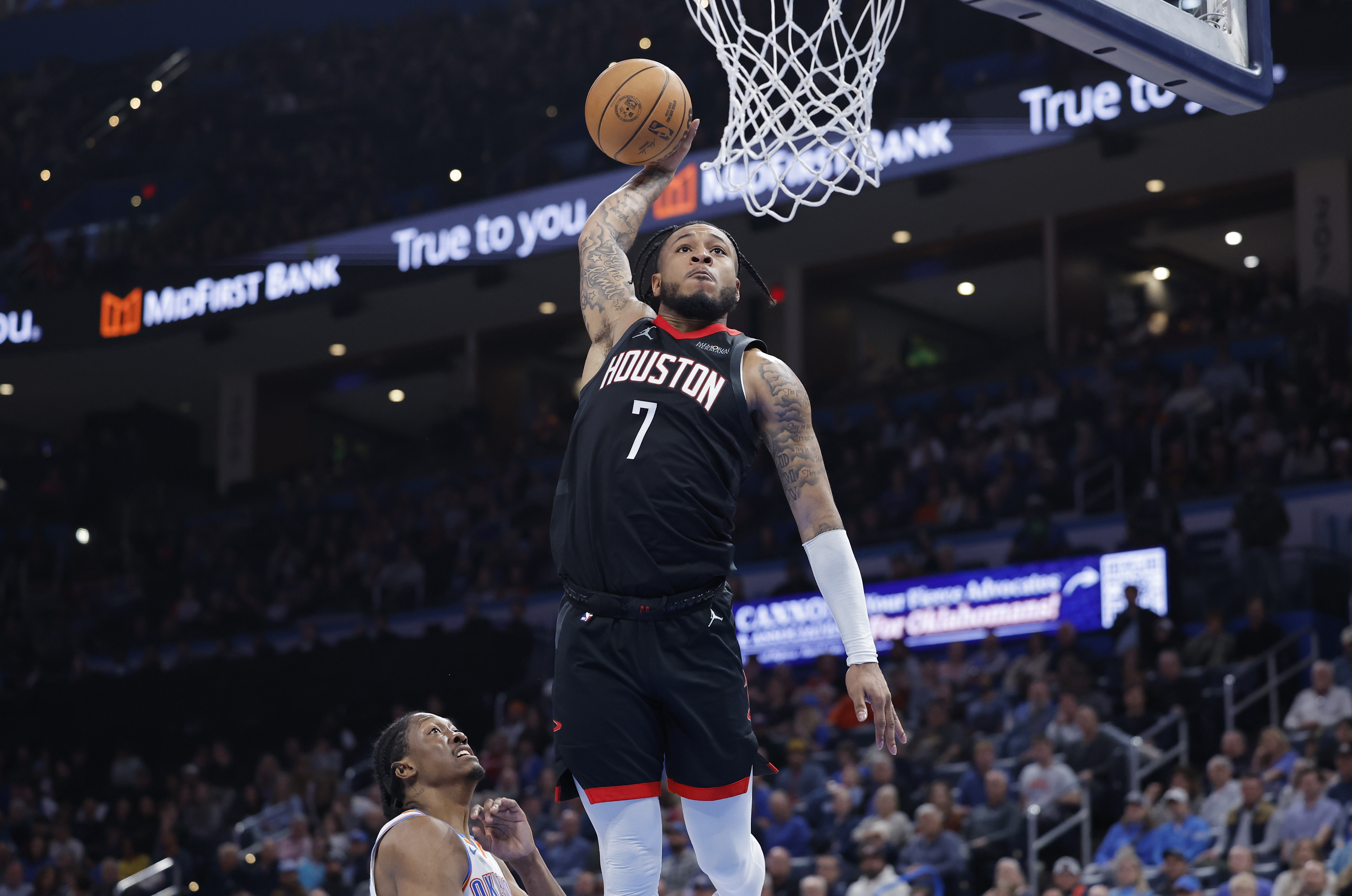 Mar 3, 2025; Oklahoma City, Oklahoma, USA; Houston Rockets forward Cam Whitmore (7) goes up for a dunk against the Oklahoma City Thunder during the second half at Paycom Center. Mandatory Credit: Alonzo Adams-Imagn Images  