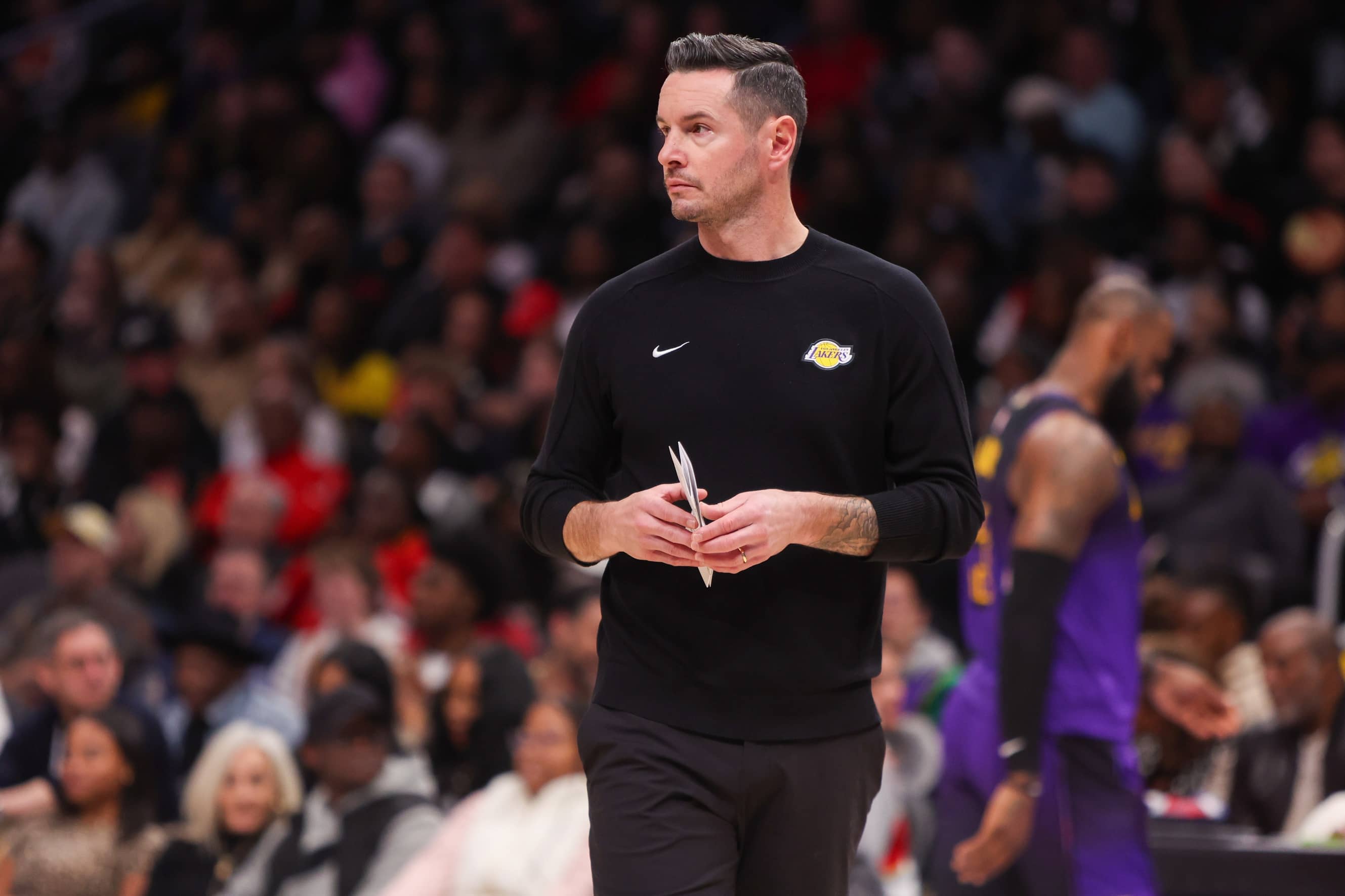 Dec 6, 2024; Atlanta, Georgia, USA; Los Angeles Lakers head coach JJ Redick during a timeout against the Atlanta Hawks in the second quarter at State Farm Arena. Mandatory Credit: Brett Davis-Imagn Images