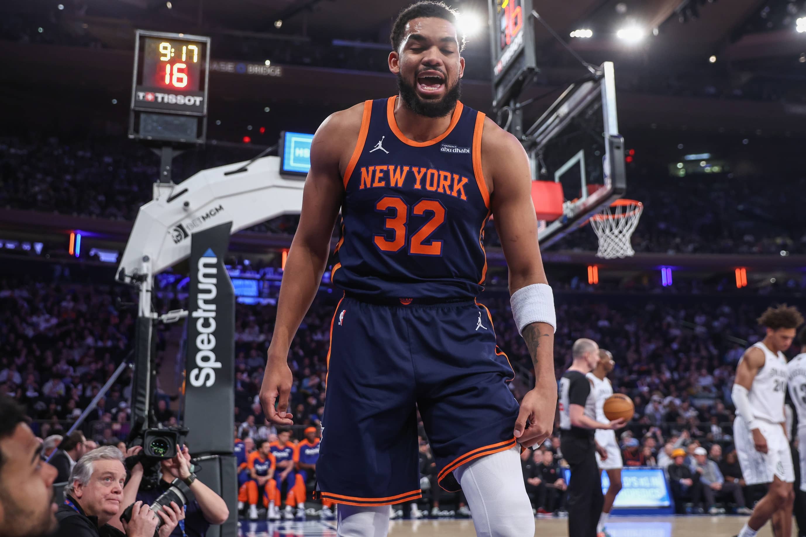 Mar 25, 2025; New York, New York, USA; New York Knicks center Karl-Anthony Towns (32) reacts after getting fouled in the first quarter against the Dallas Mavericks at Madison Square Garden. Mandatory Credit: Wendell Cruz-Imagn Images