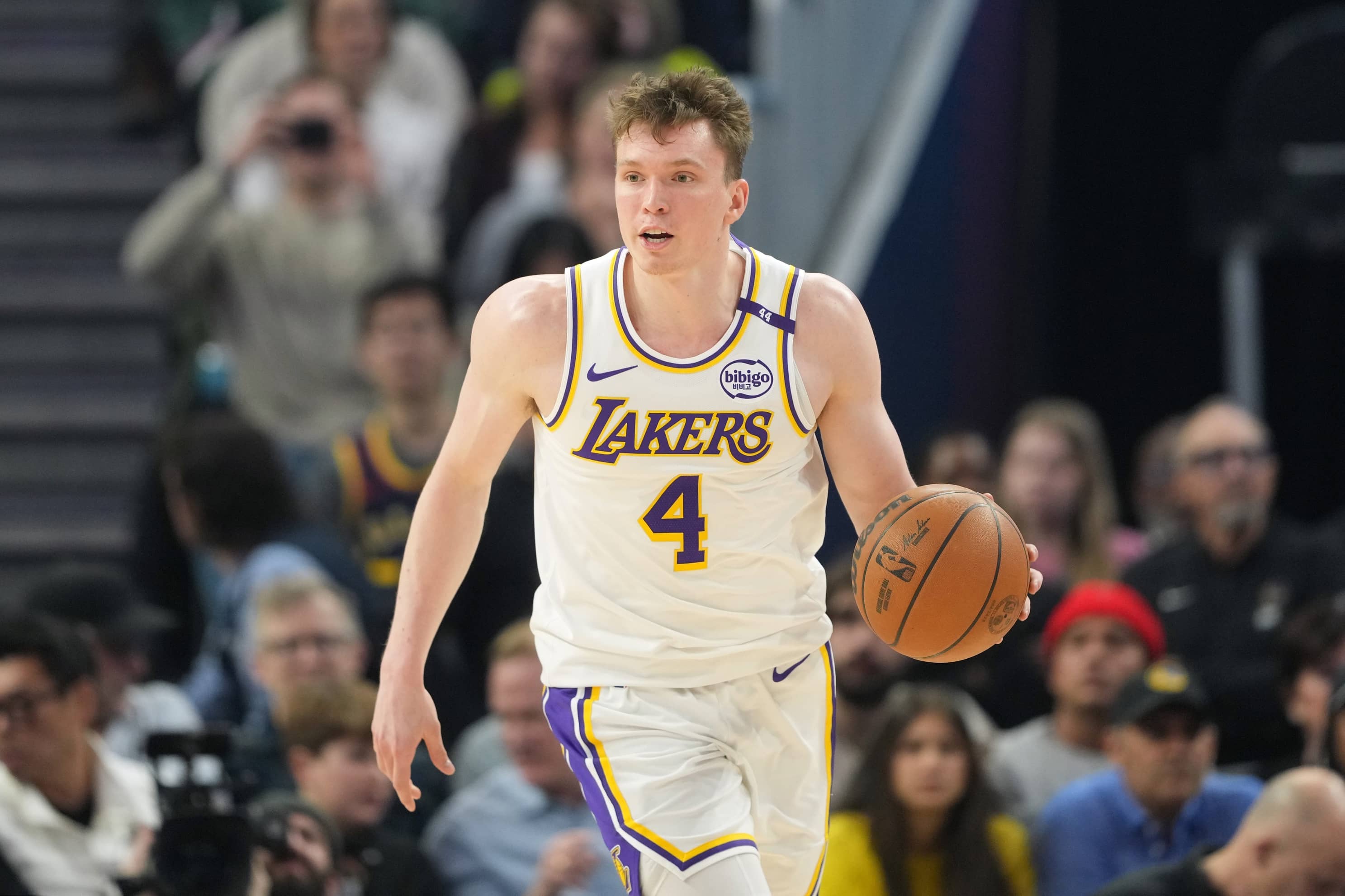 Los Angeles Lakers guard Dalton Knecht (4) dribbles against the Golden State Warriors during the second quarter at Chase Center.