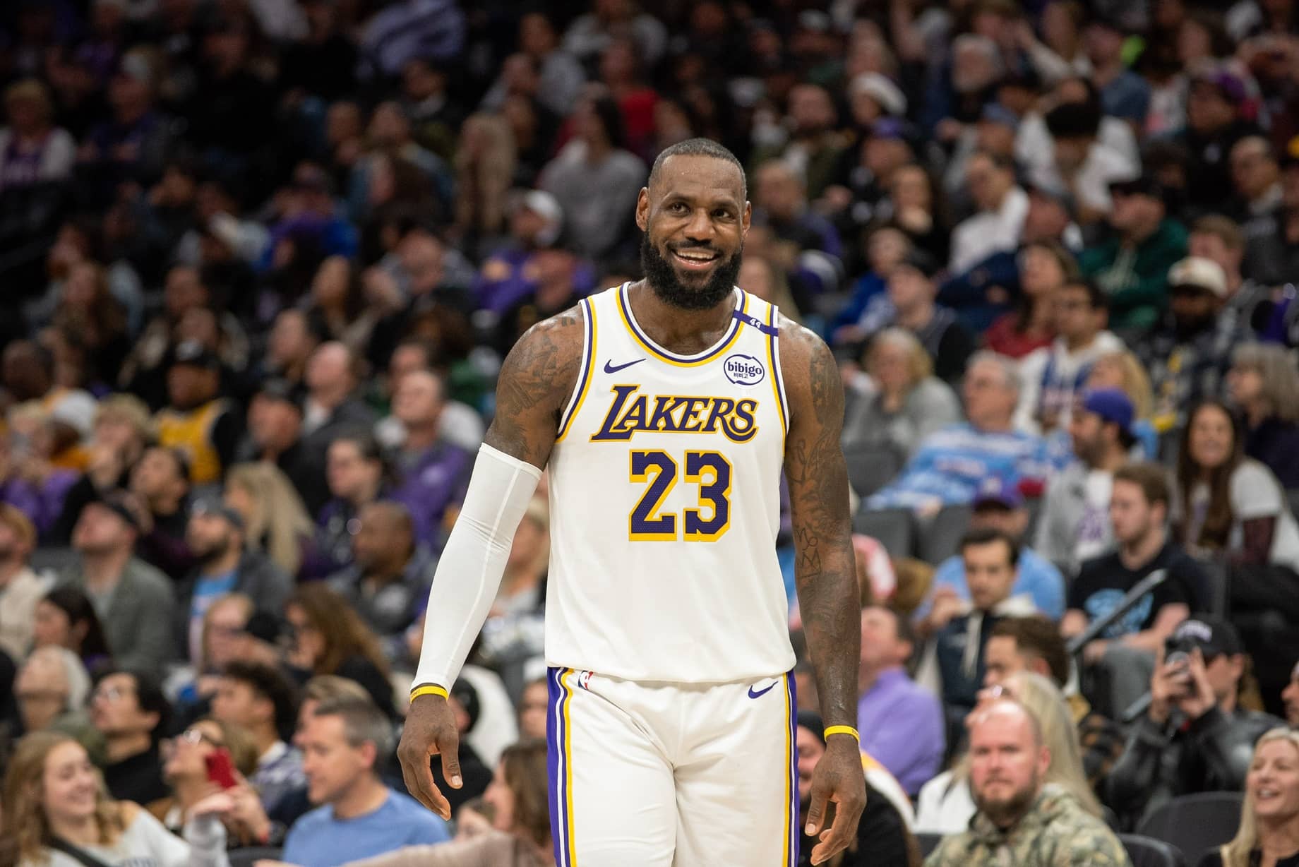 Dec 21, 2024; Sacramento, California, USA; Los Angeles Lakers forward LeBron James (23) smiles after his team scored against the Sacramento Kings during the fourth quarter at Golden 1 Center.