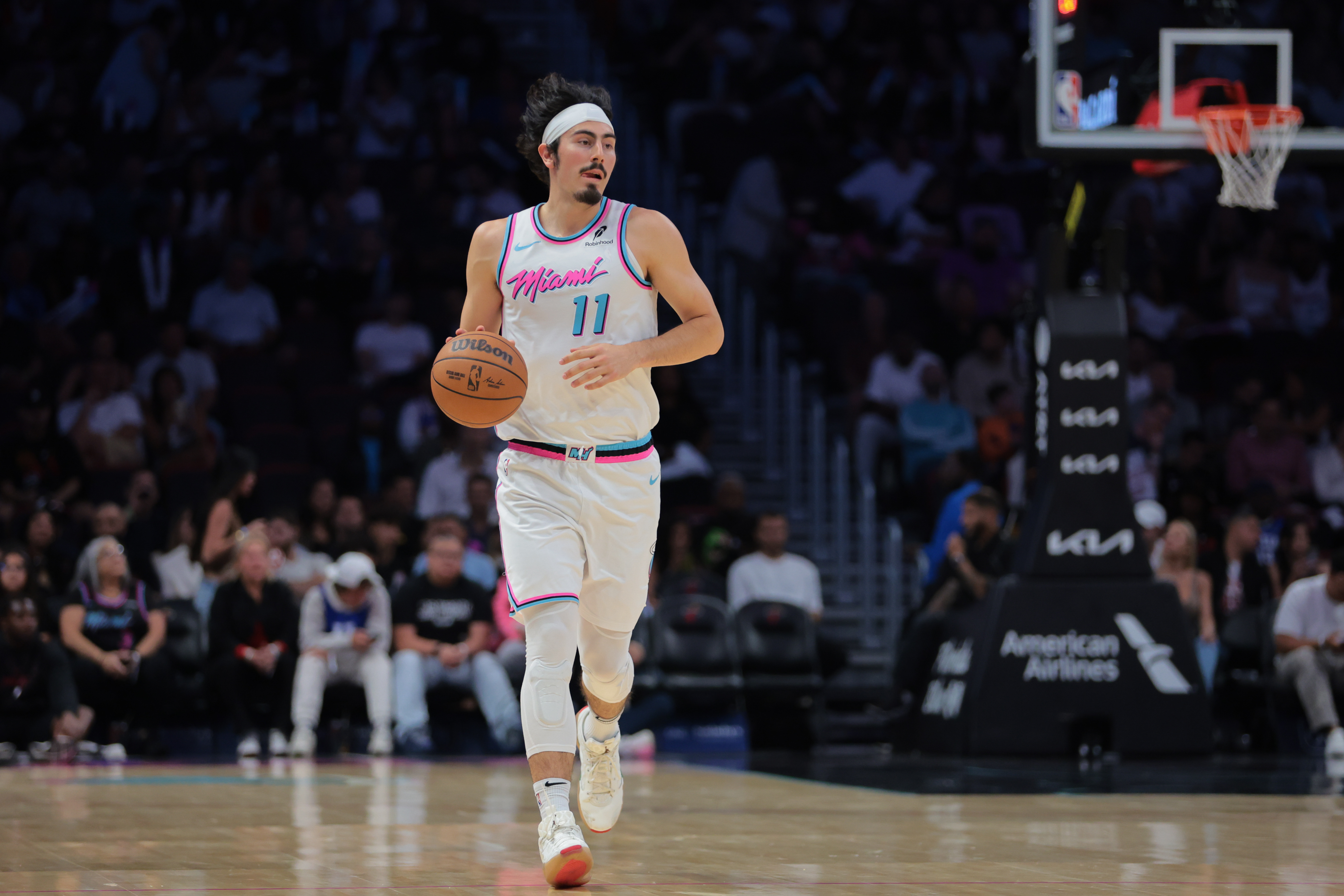 Apr 7, 2025; Miami, Florida, USA; Miami Heat guard Jaime Jaquez Jr. (11) dribbles the basketball against the Philadelphia 76ers during the second quarter at Kaseya Center. Mandatory Credit: Sam Navarro-Imagn Images  
