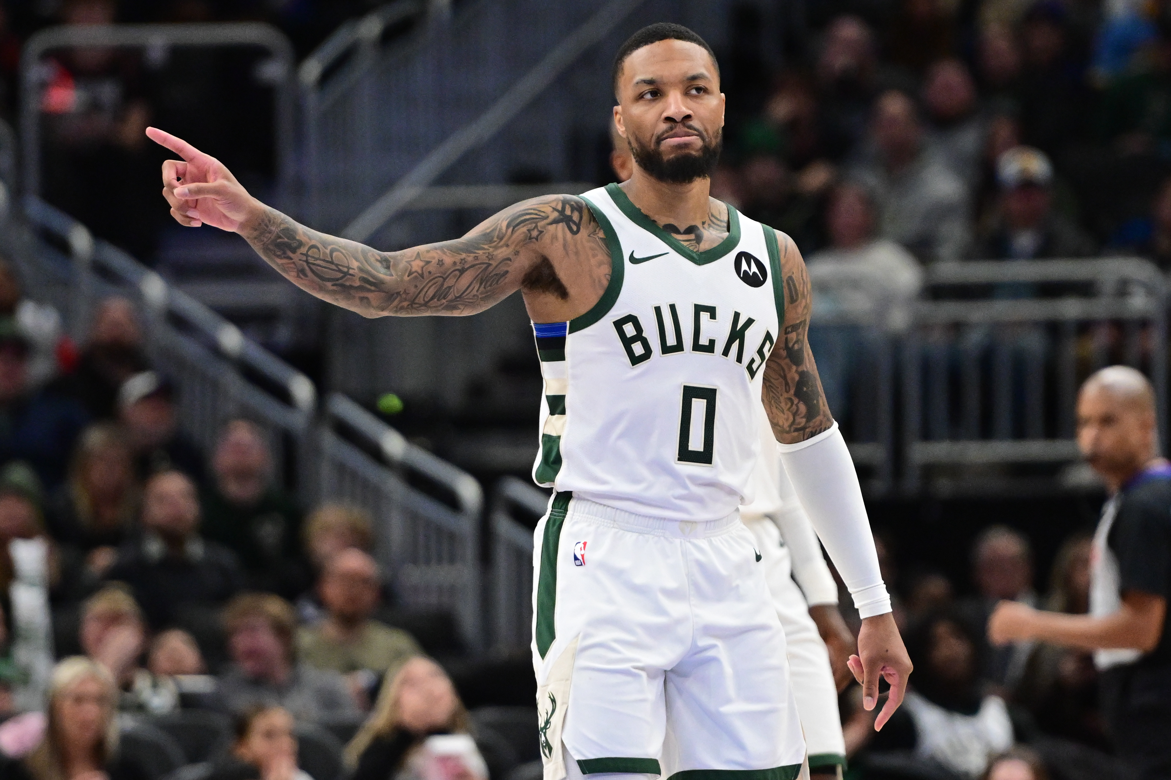 Jan 4, 2025; Milwaukee, Wisconsin, USA; Milwaukee Bucks guard Damian Lillard (0) gestures in the third quarter against the Portland Trail Blazers at Fiserv Forum. Mandatory Credit: Benny Sieu-Imagn Images  