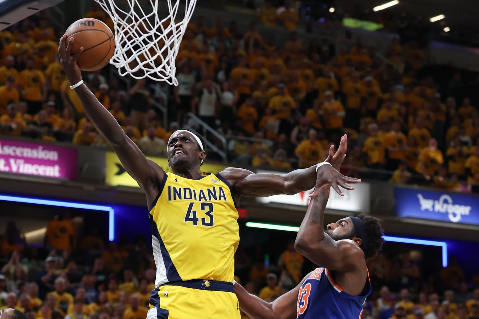 May 31, 2025; Indianapolis, Indiana, USA; Indiana Pacers forward Pascal Siakam (43) shoots the ball against New York Knicks center Mitchell Robinson (23) in the second quarterduring game six of the eastern conference finals for the 2025 NBA Playoffs at Gainbridge Fieldhouse. Mandatory Credit: Trevor Ruszkowski-Imagn Images