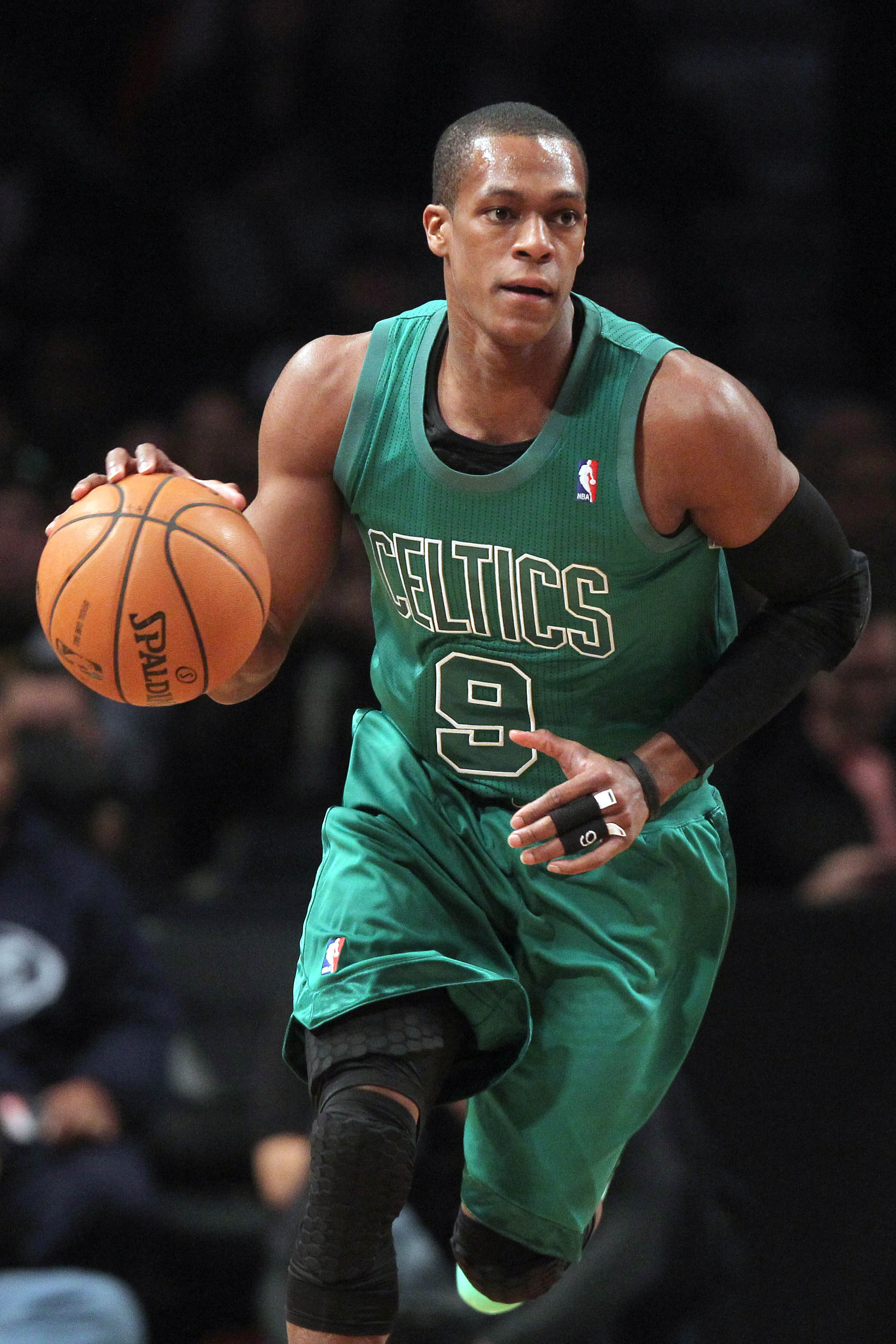 December 25, 2012; Brooklyn, NY, USA; Boston Celtics guard Rajon Rondo (9) controls the ball against the Brooklyn Nets during the first quarter of an NBA game at Barclays Center. Mandatory Credit: Brad Penner-Imagn Images  