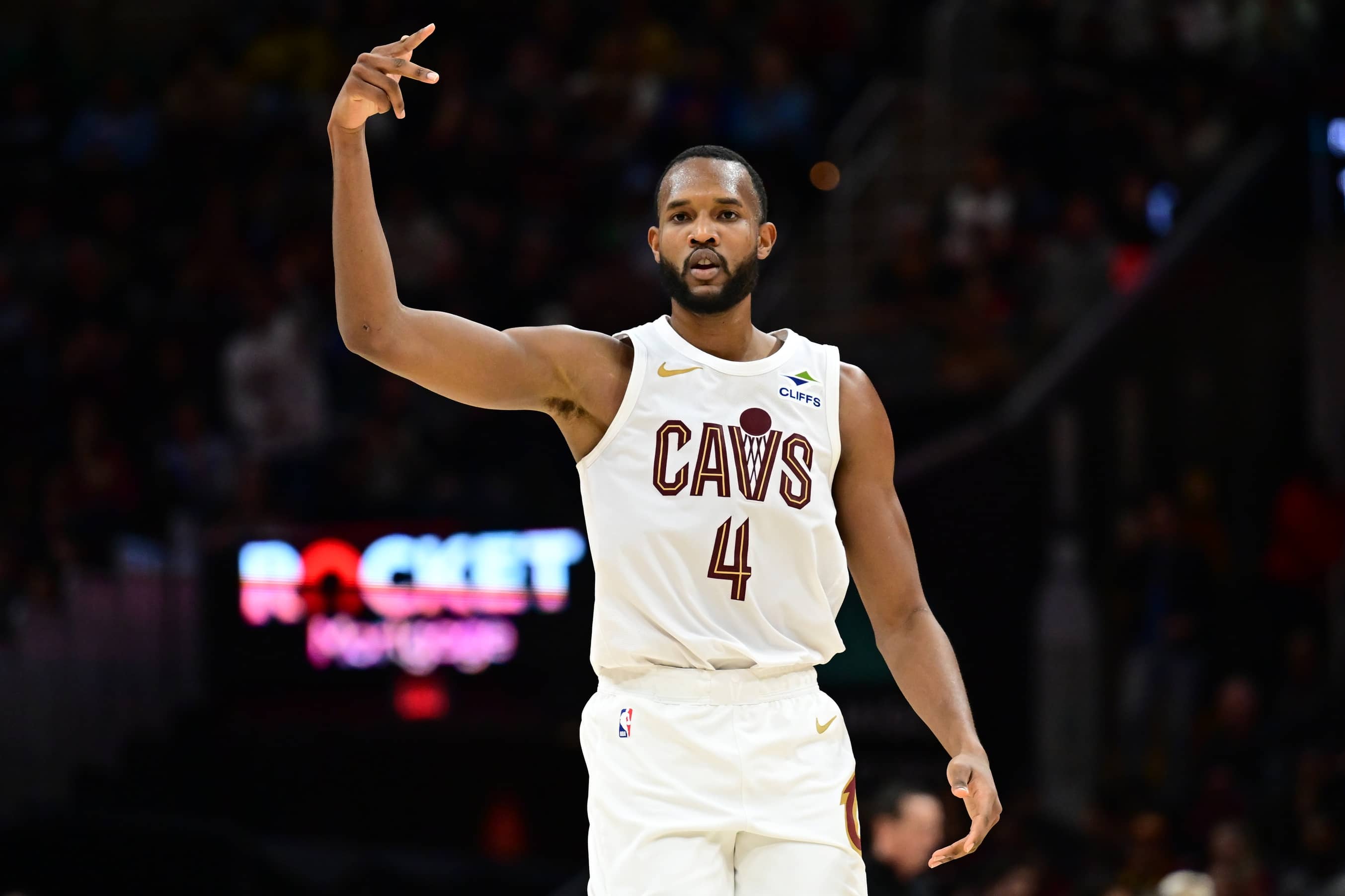 Feb 2, 2025; Cleveland, Ohio, USA; Cleveland Cavaliers forward Evan Mobley (4) celebrates after hitting a three point basket during the second half against the Dallas Mavericks at Rocket Mortgage FieldHouse. Mandatory Credit: Ken Blaze-Imagn Images