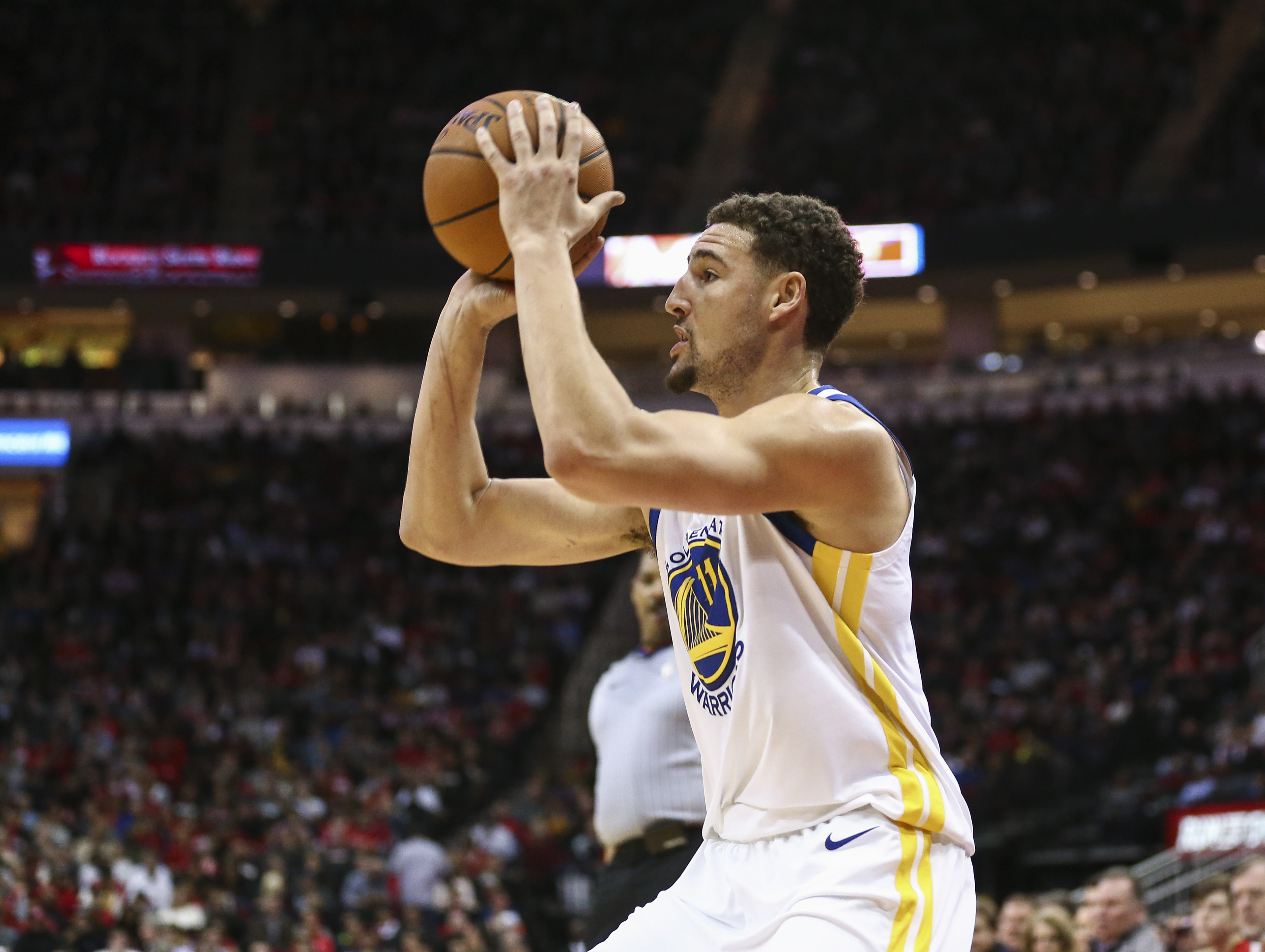 Jan 4, 2018; Houston, TX, USA; Golden State Warriors guard Klay Thompson (11) shoots the ball during the third quarter against the Houston Rockets at Toyota Center. Mandatory Credit: Troy Taormina-Imagn Images  