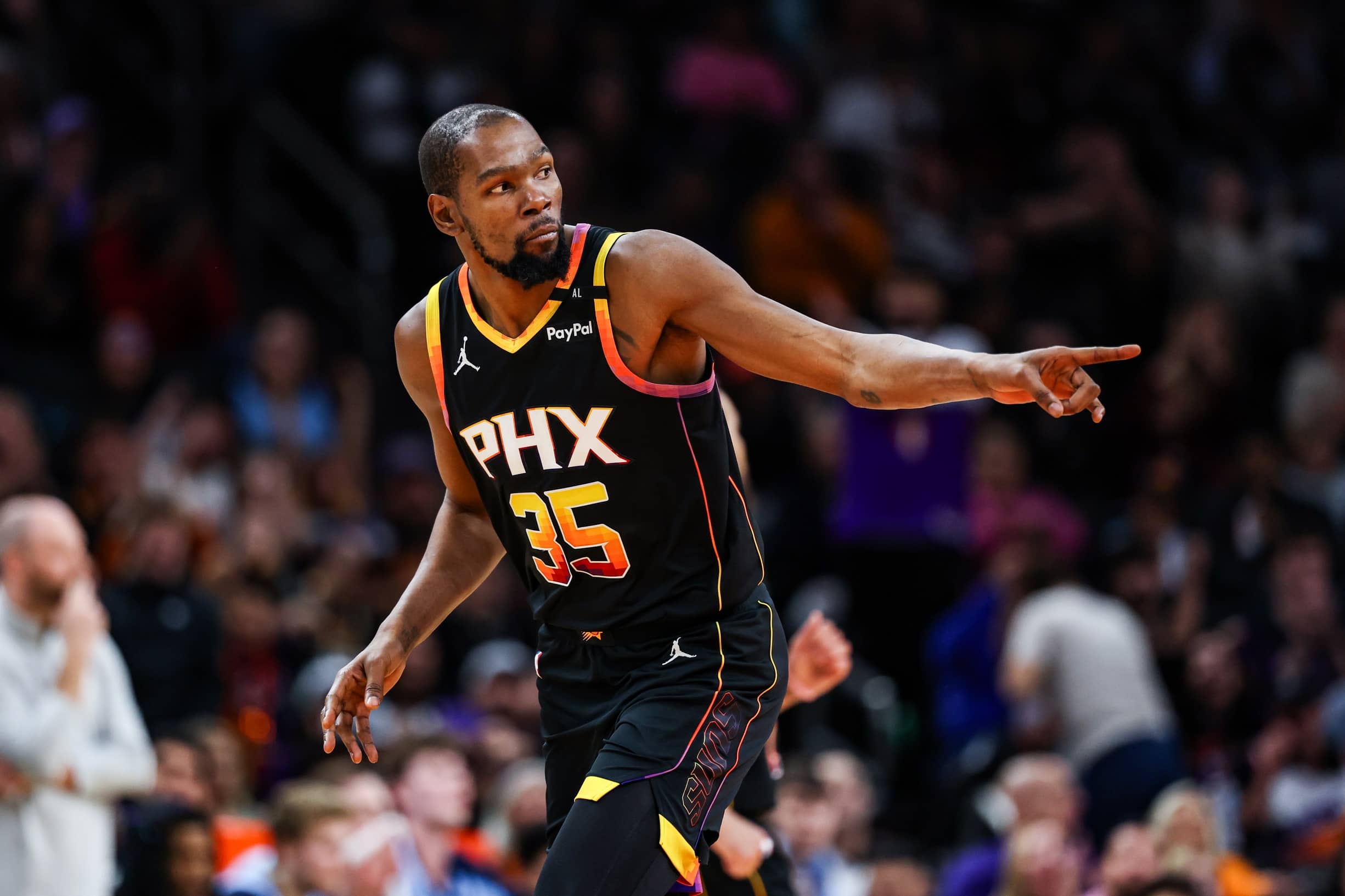 Phoenix Suns forward Kevin Durant (35) points to his teammate after he makes a three-pointer during the second quarter of the game against the Memphis Grizzlies at Footprint Center. Mandatory Credit: Aryanna Frank-Imagn Images